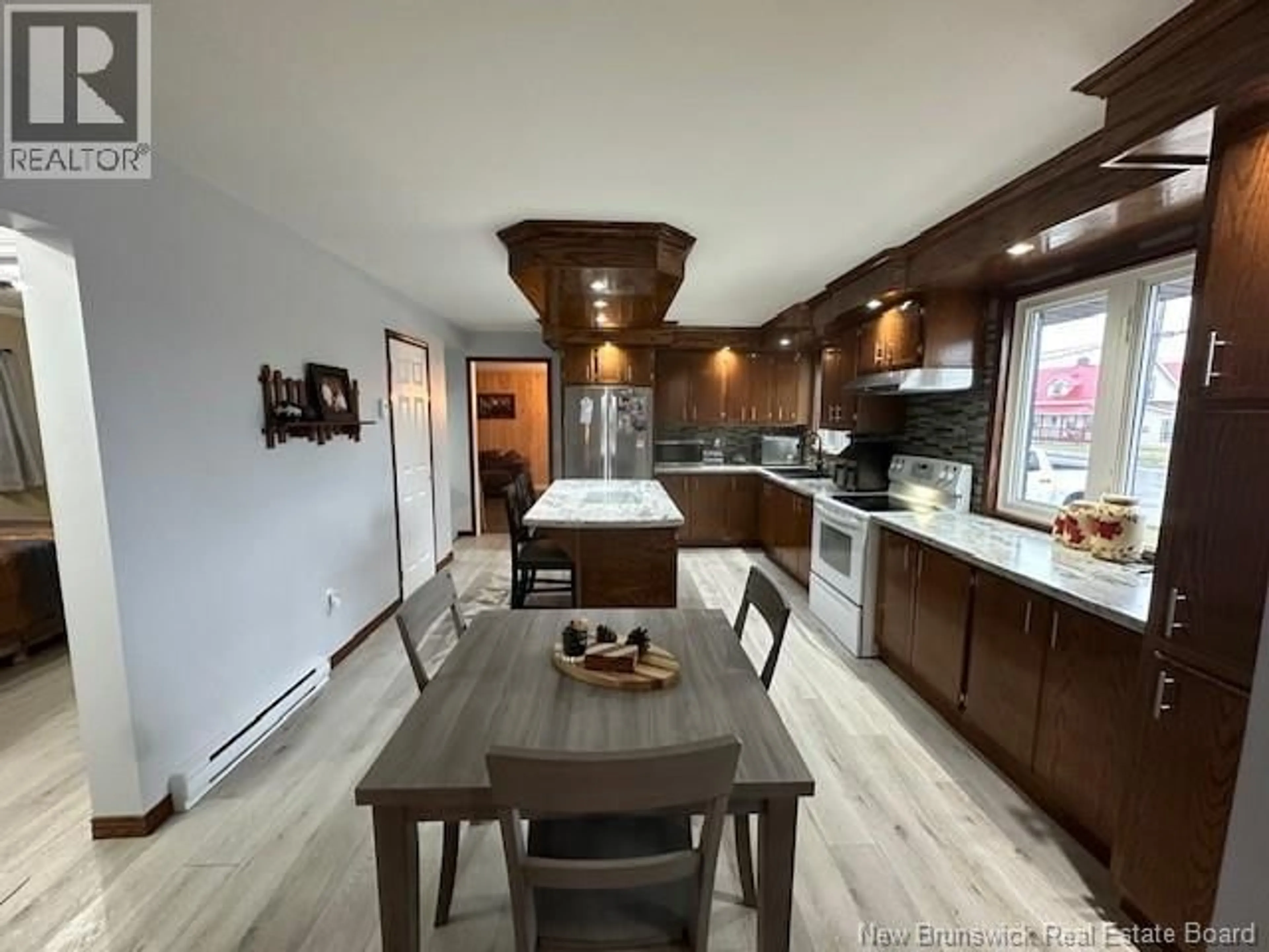 Open concept kitchen, wood/laminate floor for 372 PRINCIPALE STREET, Eel River Crossing New Brunswick E8E1T9