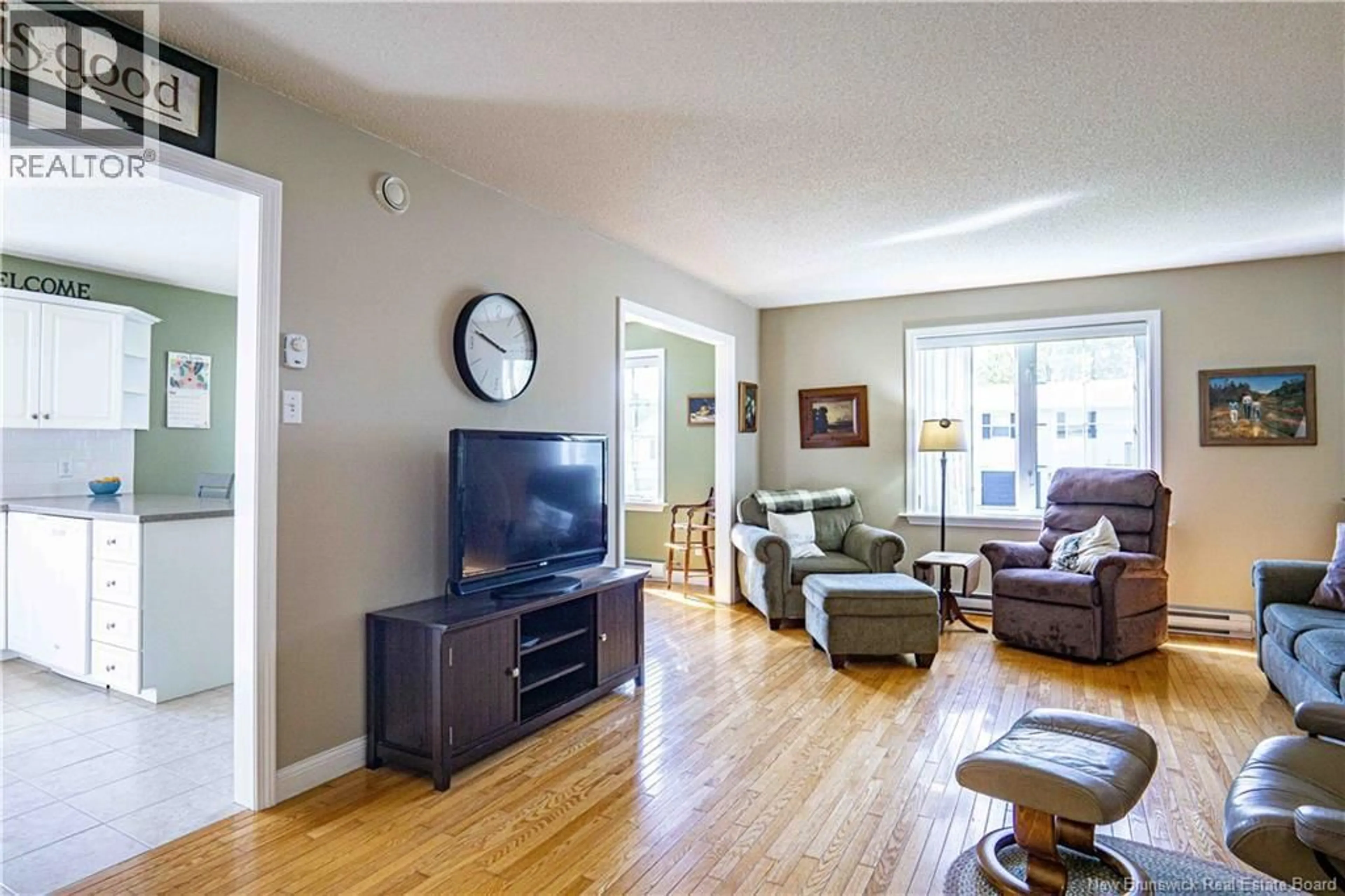 Living room with furniture, wood/laminate floor for 8 LANSDOWN STREET, Oromocto New Brunswick E2V4P3