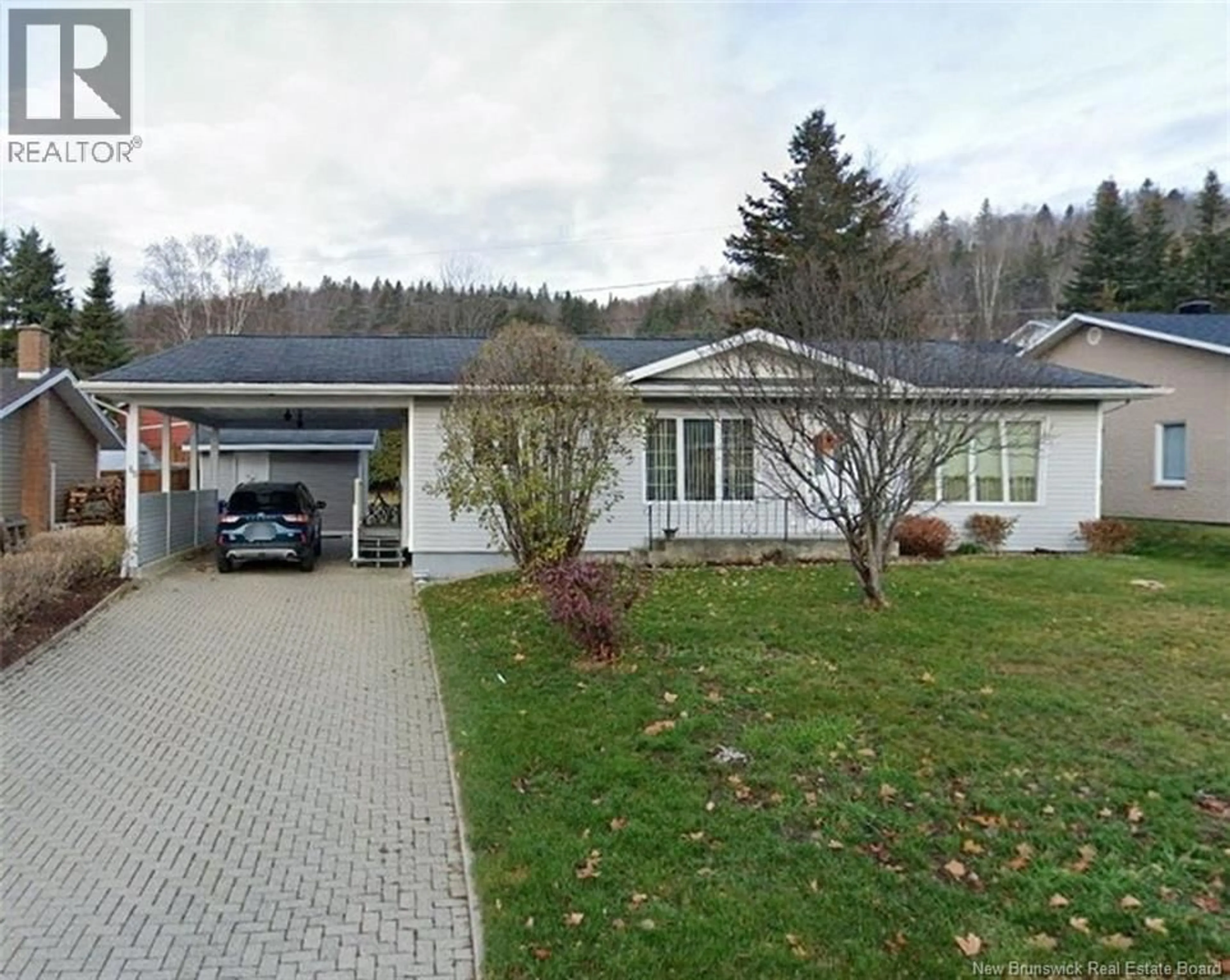 A pic from outside/outdoor area/front of a property/back of a property/a pic from drone, street for 60 CHOUINARD AVENUE, Edmundston New Brunswick E3V3L8