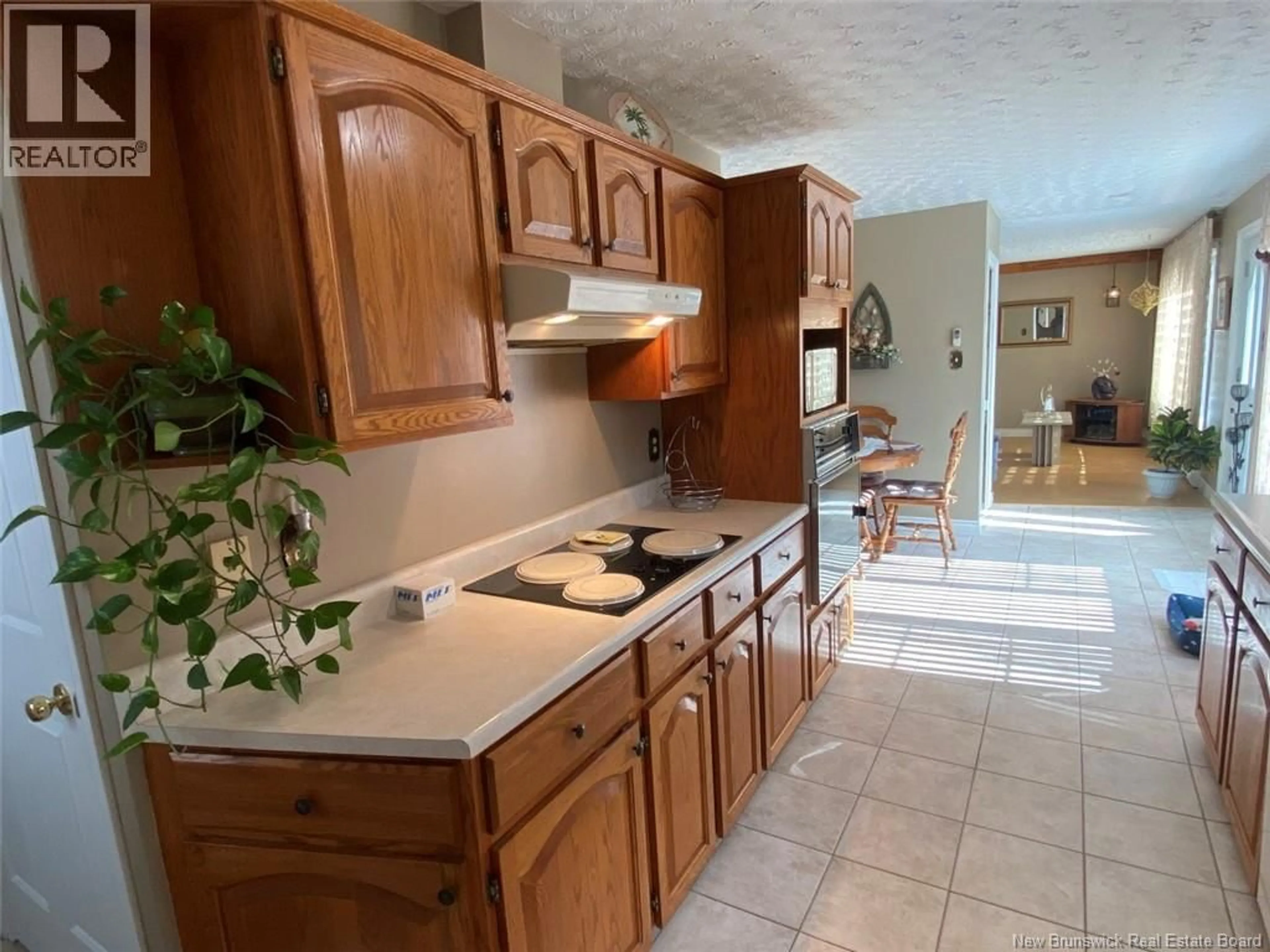Standard kitchen, ceramic/tile floor for 60 CHOUINARD AVENUE, Edmundston New Brunswick E3V3L8