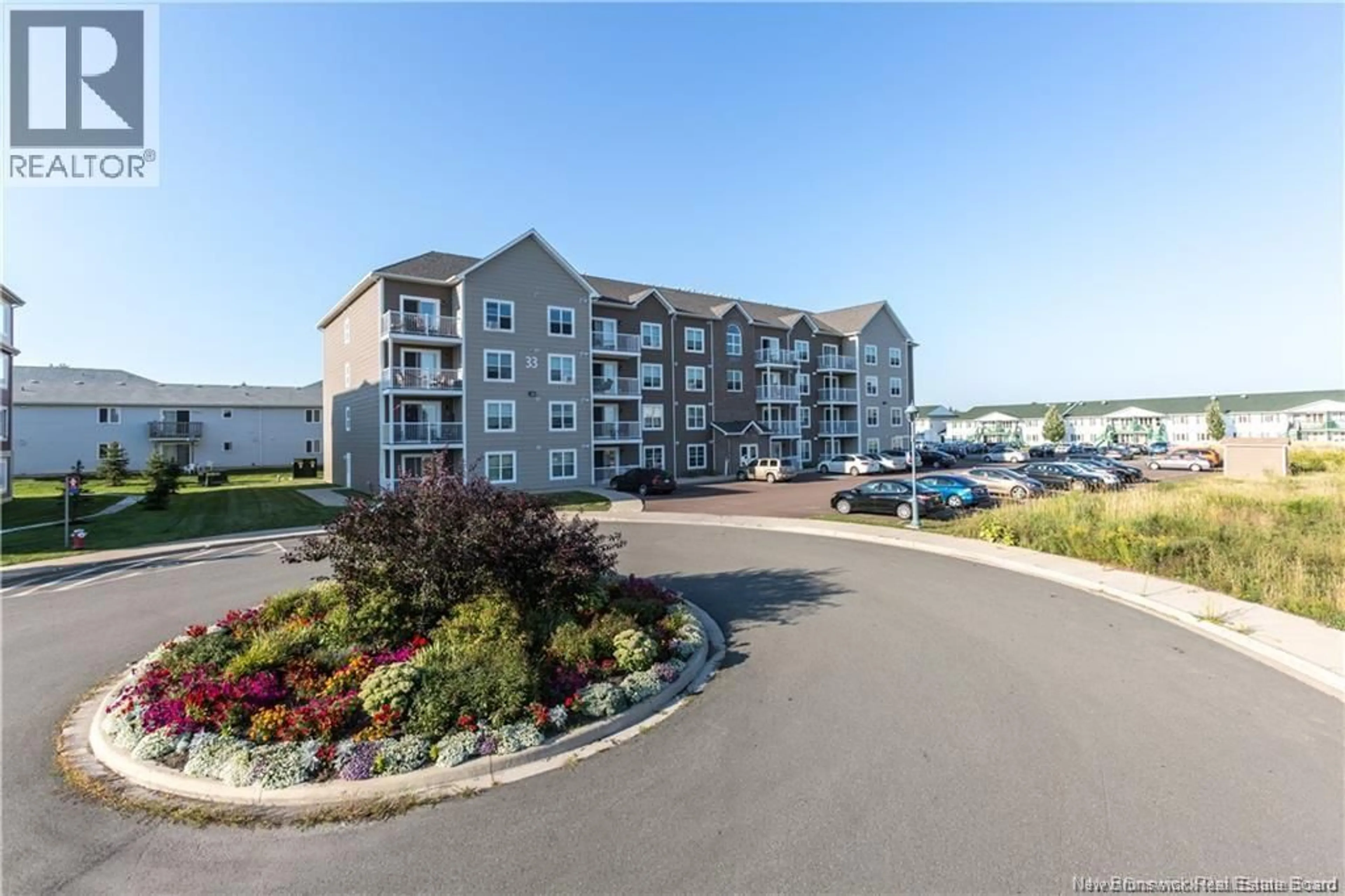 A pic from outside/outdoor area/front of a property/back of a property/a pic from drone, water/lake/river/ocean view for 206 - 33 SIFROI STREET, Dieppe New Brunswick E1A1L6