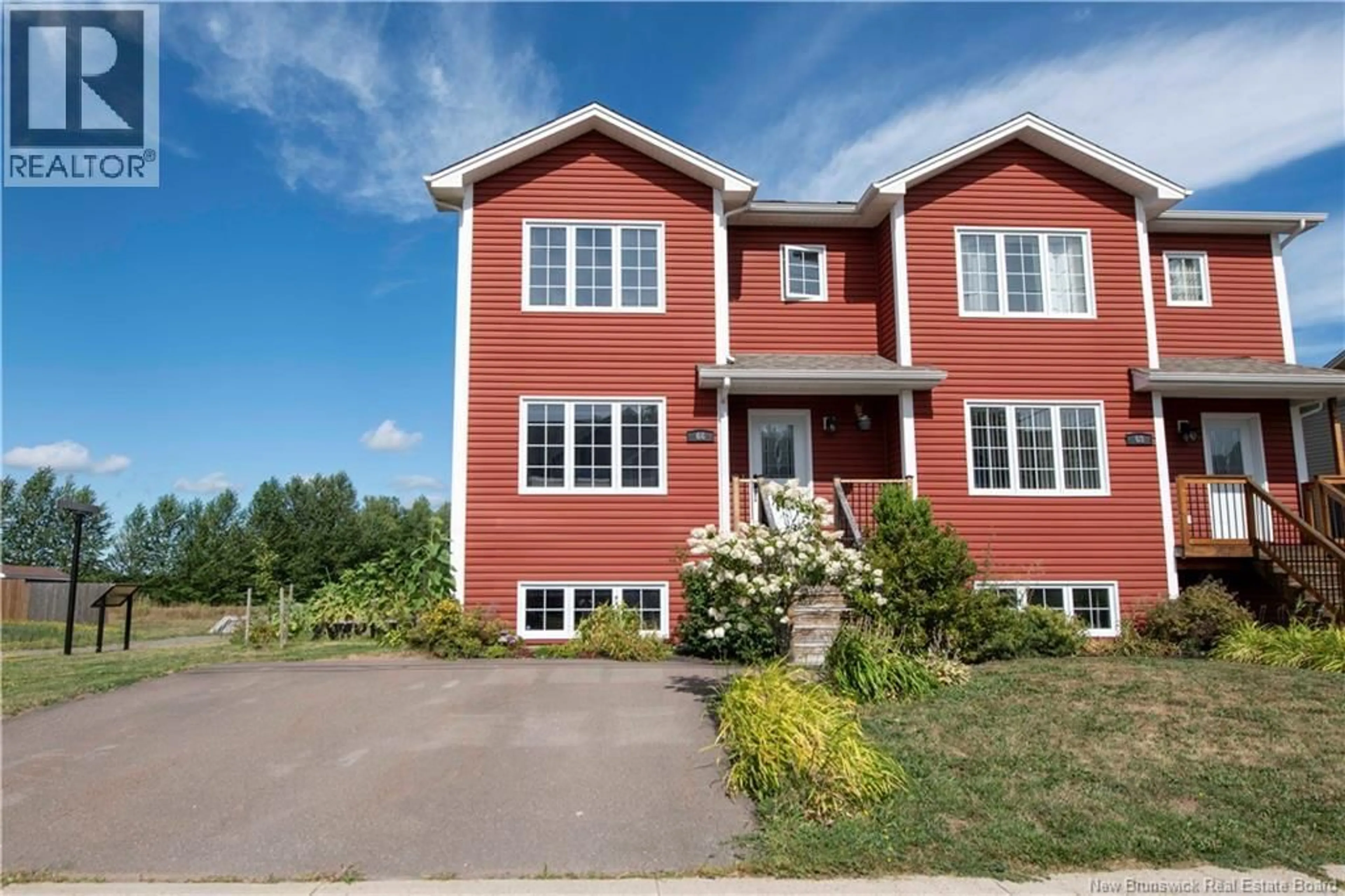 Home with brick exterior material, street for 66 BELLE FORET, Dieppe New Brunswick E1A8X9