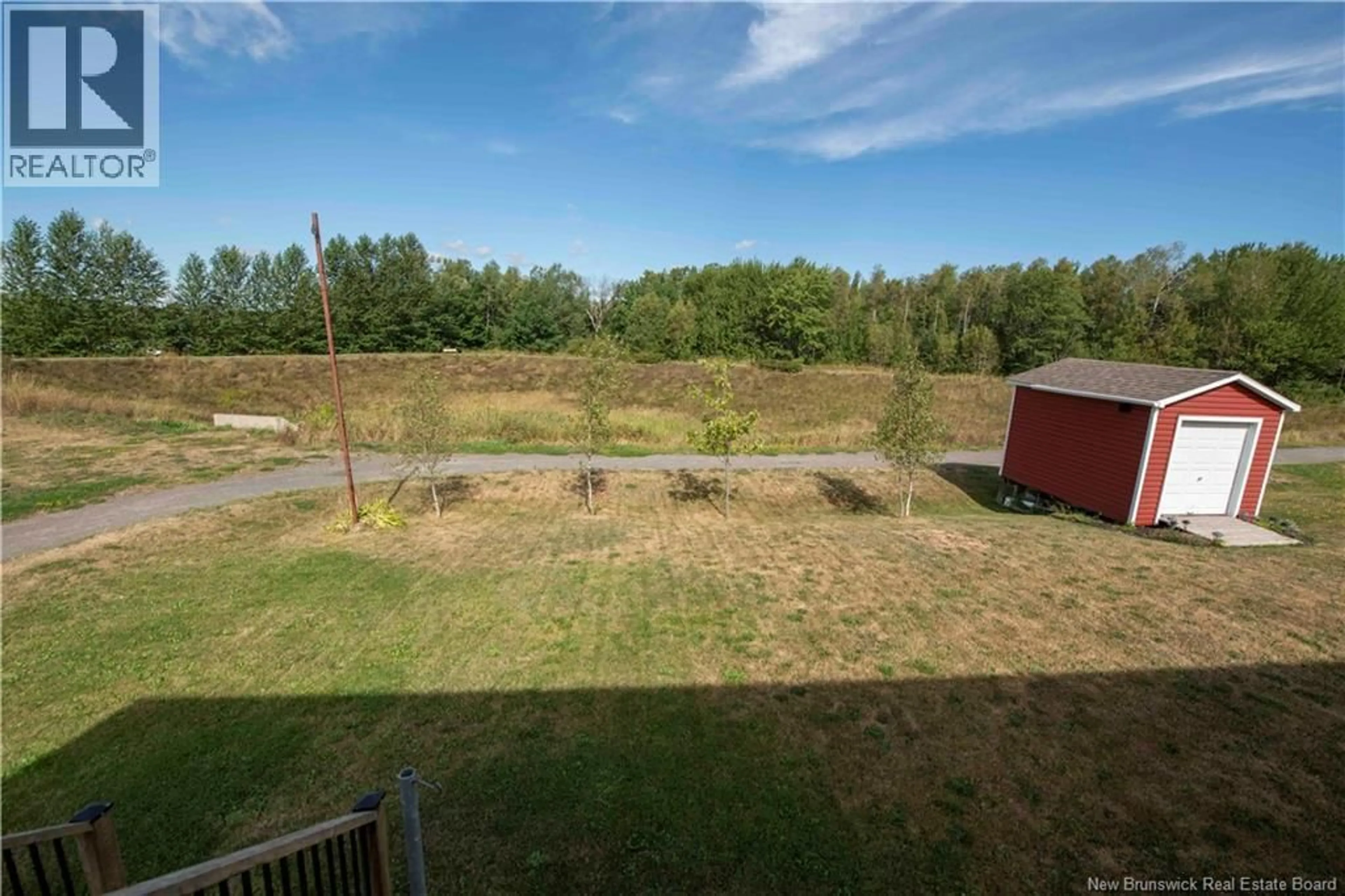 A pic from outside/outdoor area/front of a property/back of a property/a pic from drone, water/lake/river/ocean view for 66 BELLE FORET, Dieppe New Brunswick E1A8X9