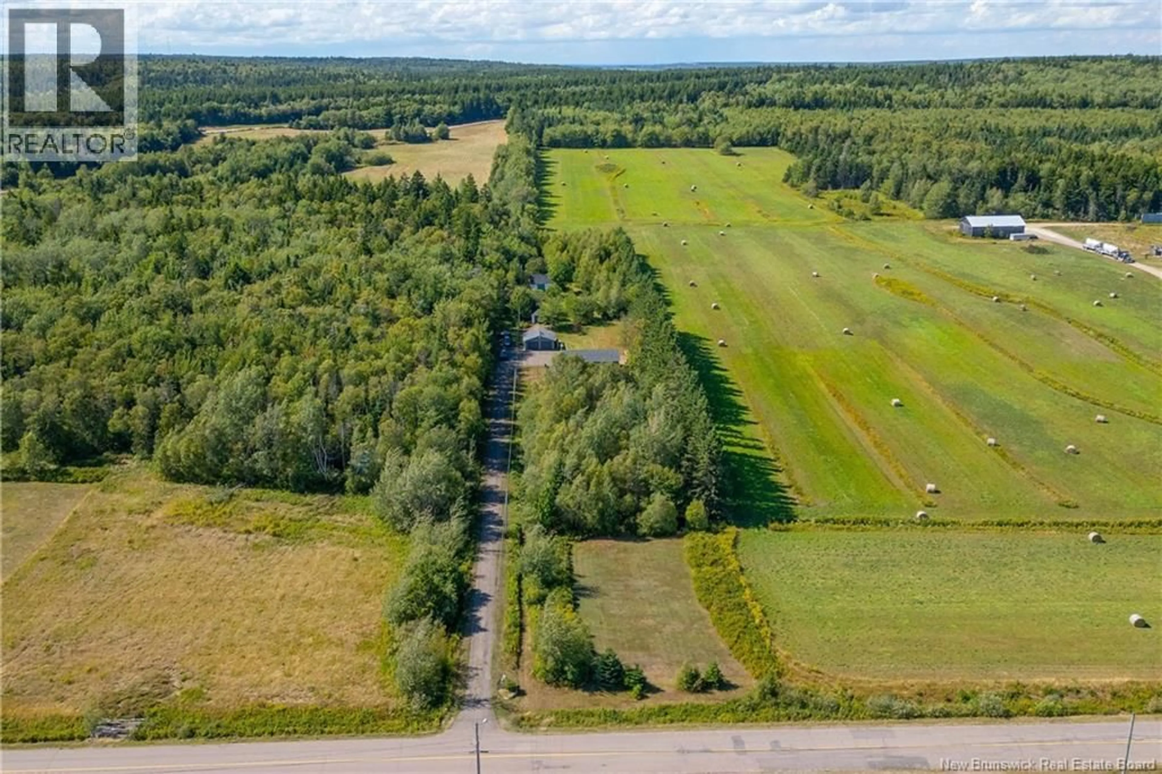 A pic from outside/outdoor area/front of a property/back of a property/a pic from drone, forest/trees view for 52 STANLEY DRIVE, Sackville New Brunswick E4L1P8