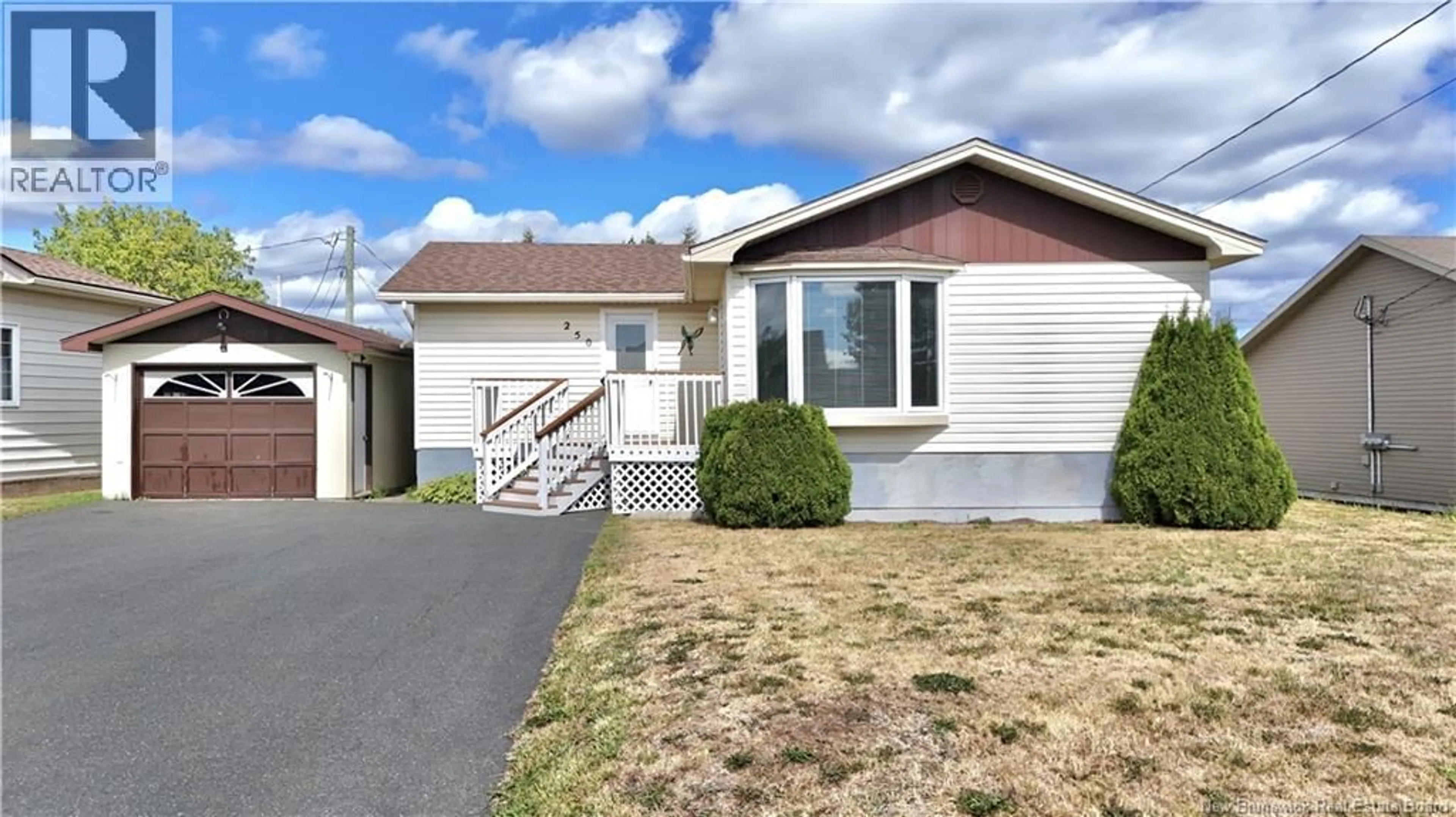 Home with vinyl exterior material, street for 250 GODIN, Beresford New Brunswick E8K1T7