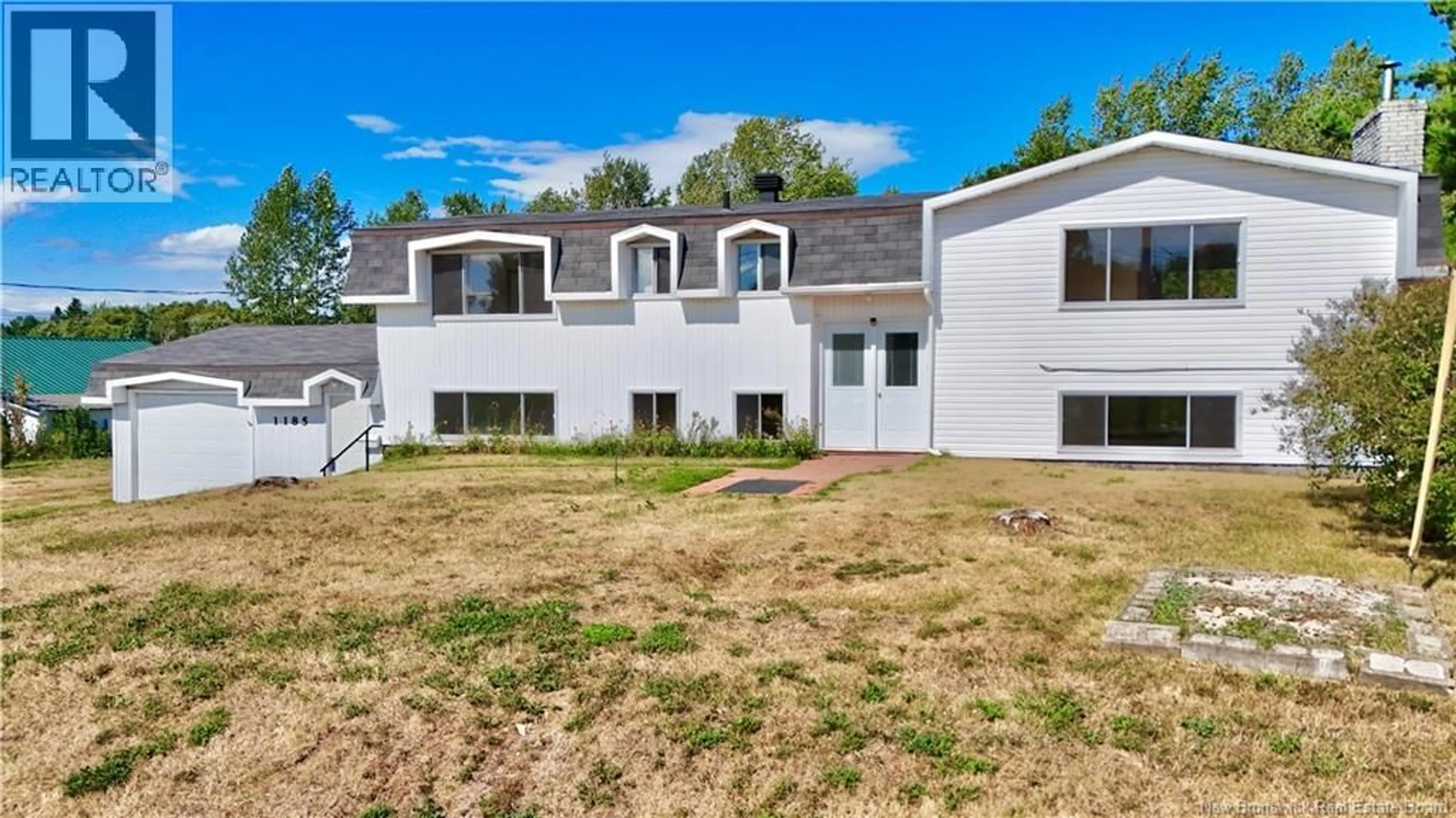 A pic from outside/outdoor area/front of a property/back of a property/a pic from drone, unknown for 1185 BRYAR, Beresford New Brunswick E8K1B2