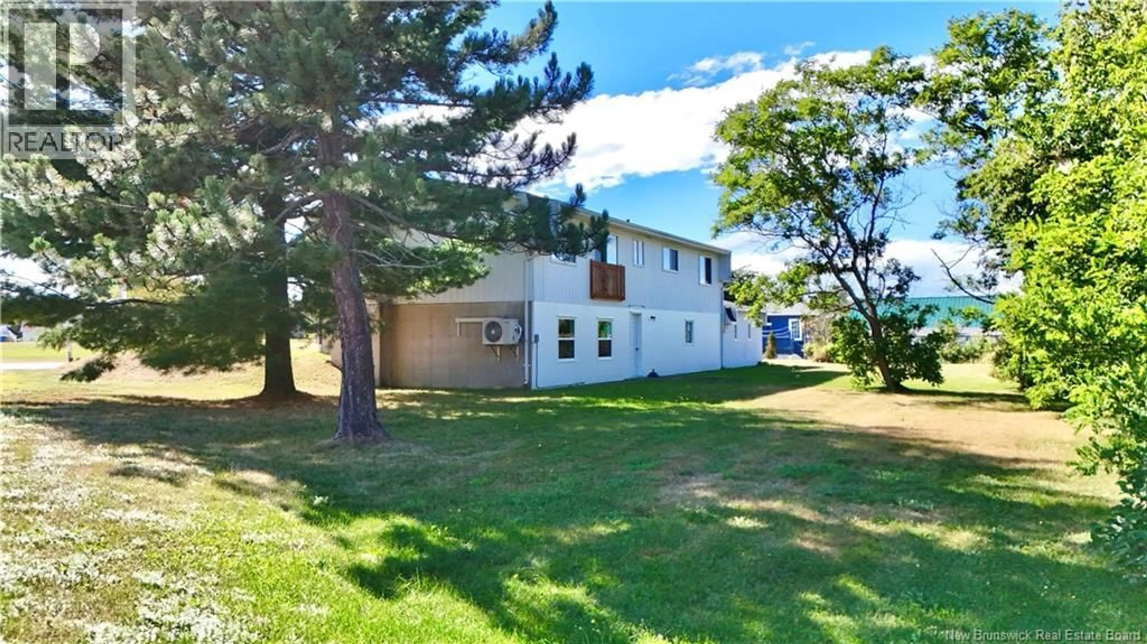 A pic from outside/outdoor area/front of a property/back of a property/a pic from drone, water/lake/river/ocean view for 1185 BRYAR, Beresford New Brunswick E8K1B2