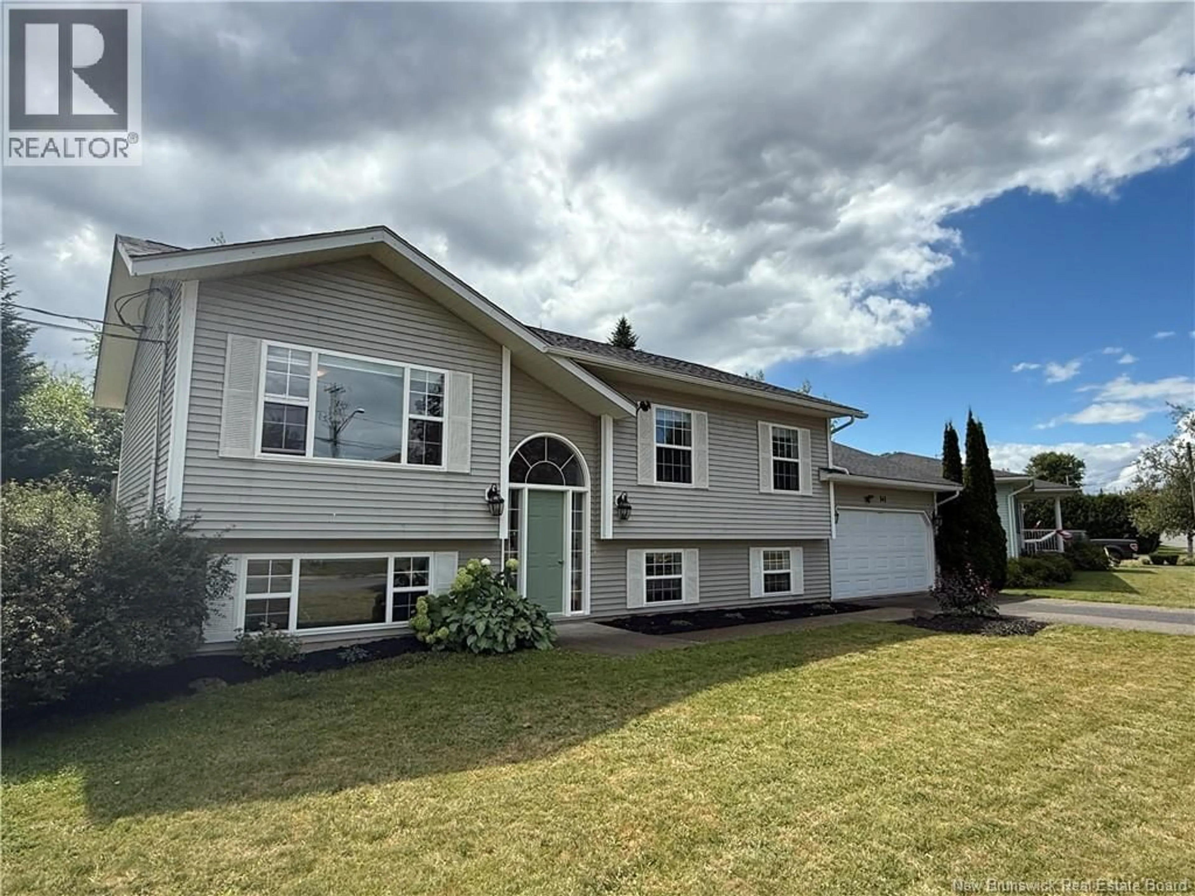 Home with vinyl exterior material, street for 141 EASTWOOD DRIVE, Woodstock New Brunswick E7M1P7