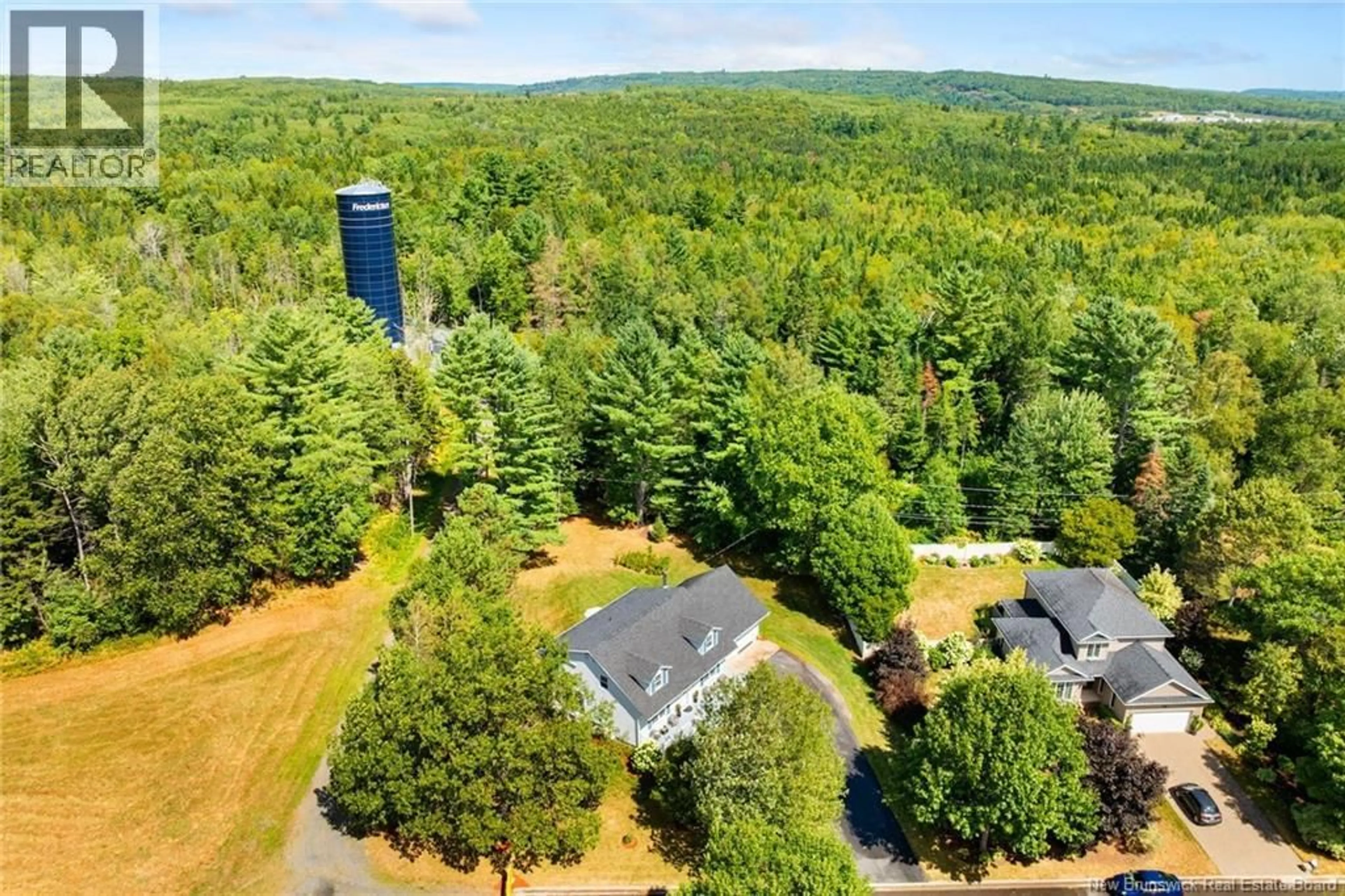 A pic from outside/outdoor area/front of a property/back of a property/a pic from drone, forest/trees view for 43 EMERALD STREET, Fredericton New Brunswick E3G7V3