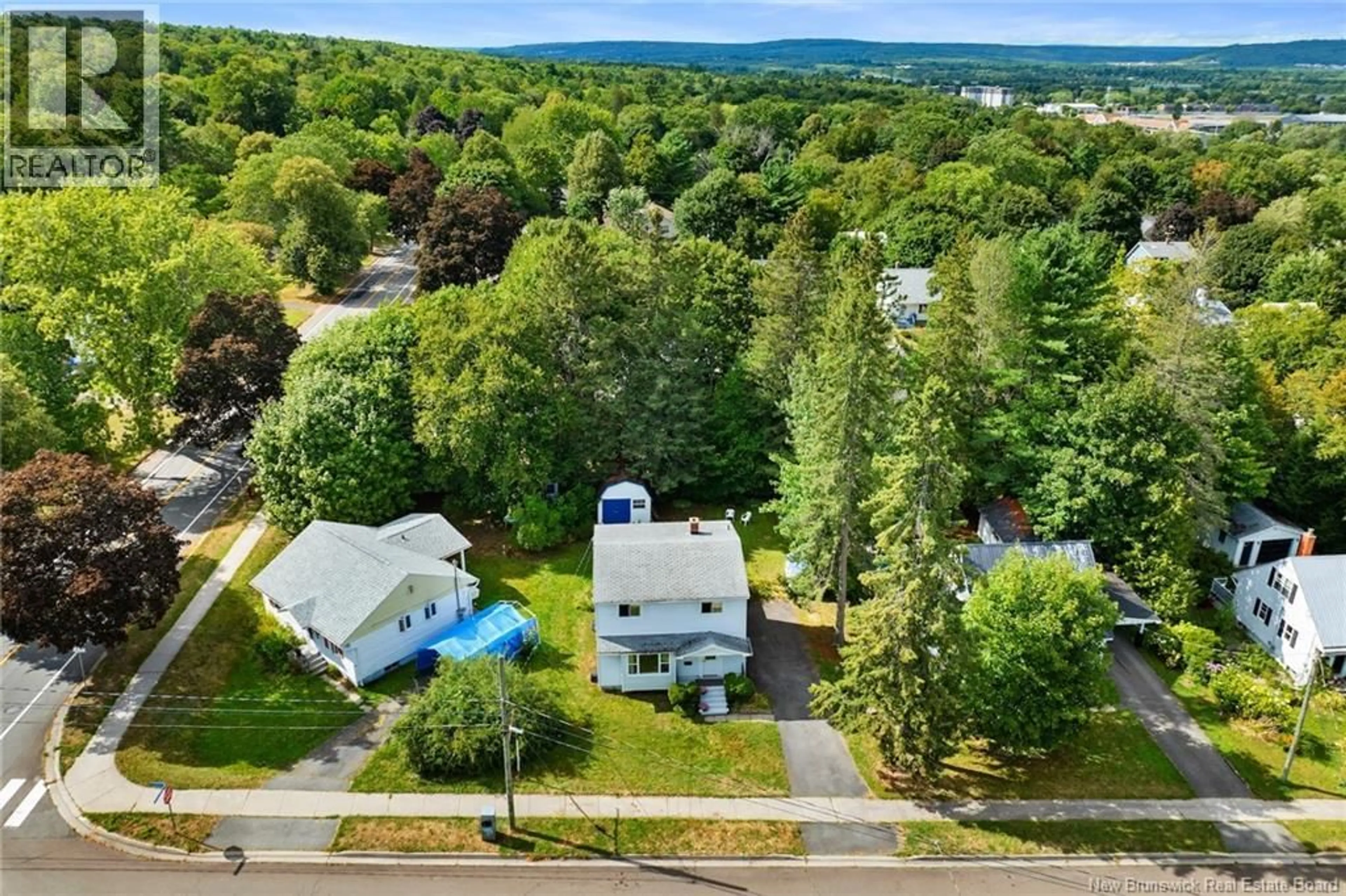 A pic from outside/outdoor area/front of a property/back of a property/a pic from drone, unknown for 737 REID STREET, Fredericton New Brunswick E3B3V6
