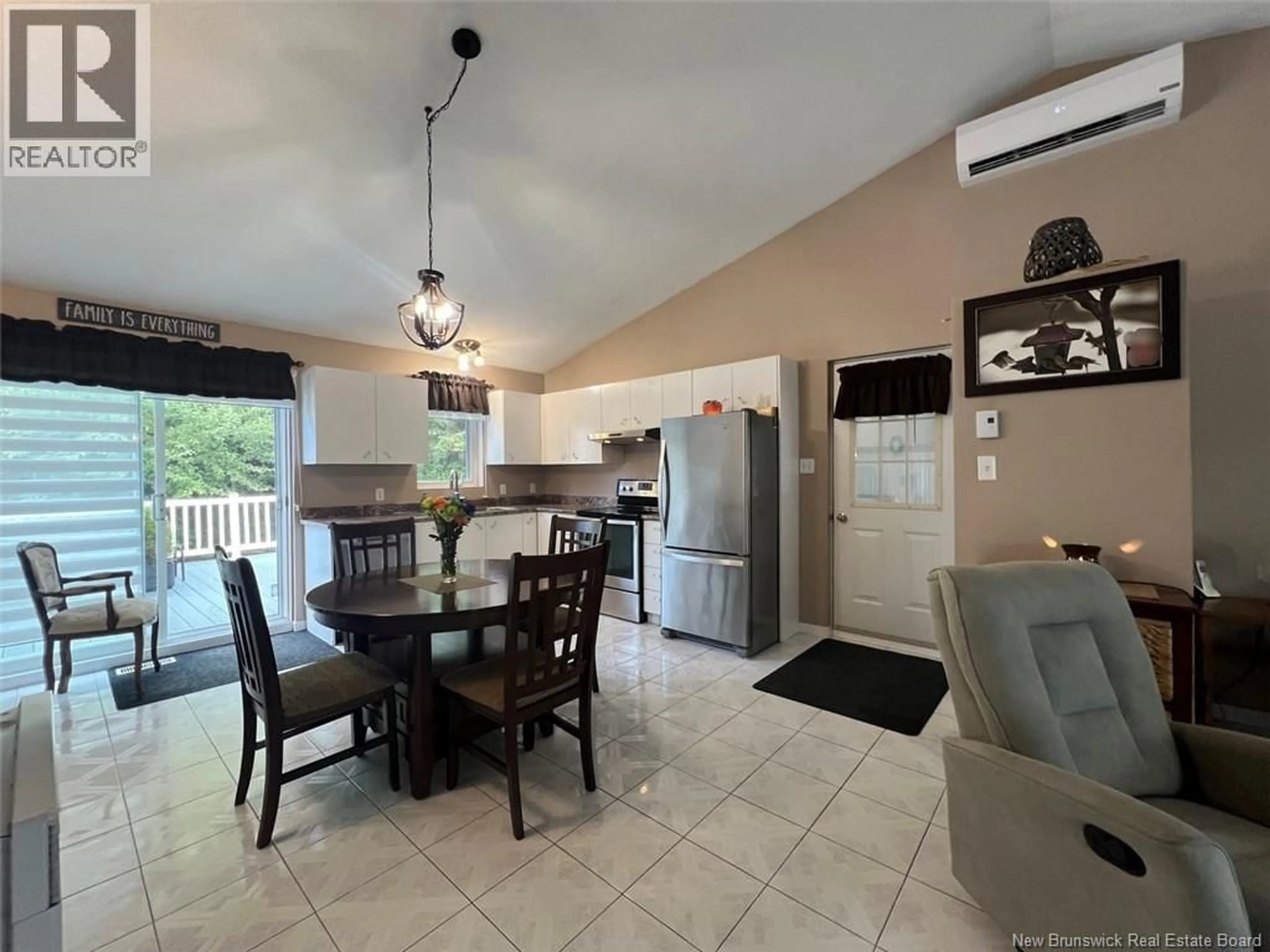Open concept kitchen, ceramic/tile floor for 30 DES GOUVERNEURS STREET, Edmundston New Brunswick E3V4H5