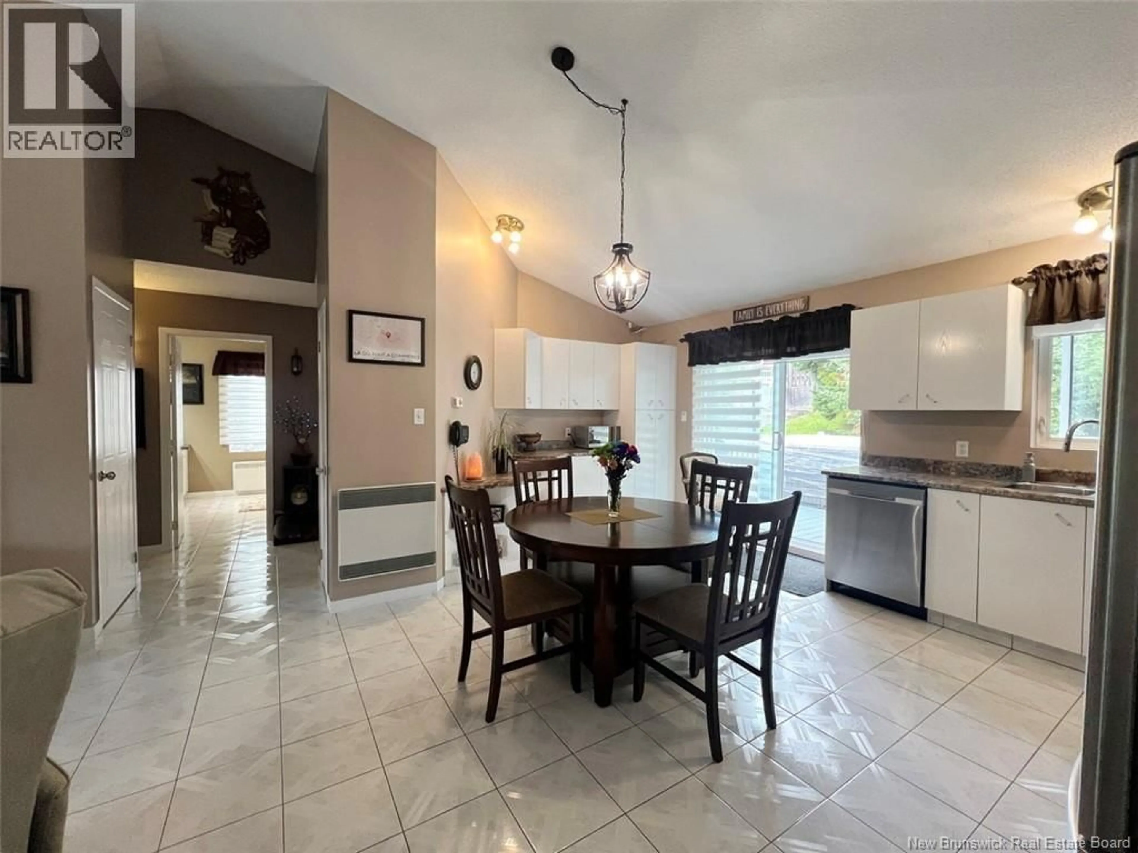 Open concept kitchen, ceramic/tile floor for 30 DES GOUVERNEURS STREET, Edmundston New Brunswick E3V4H5