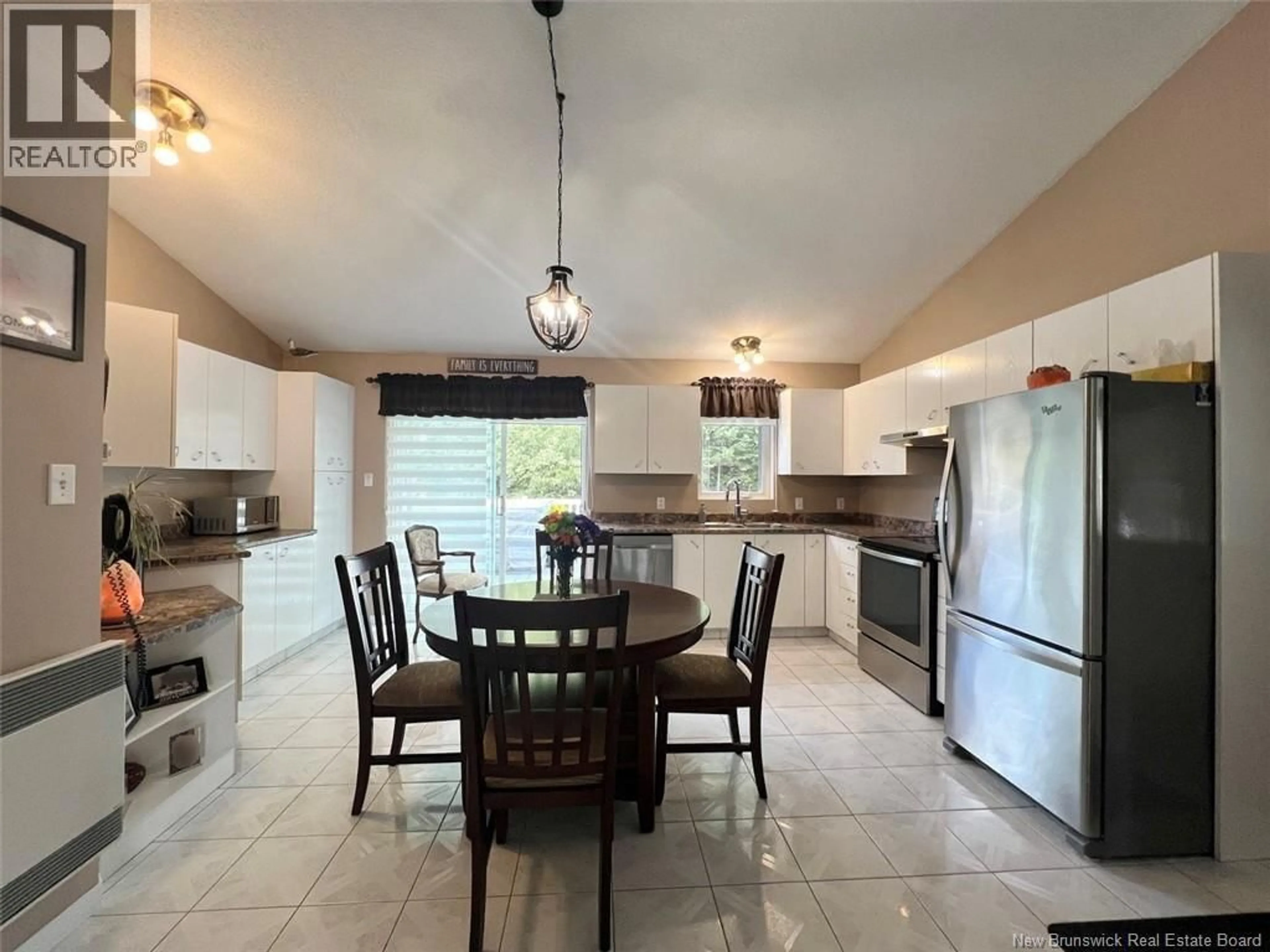 Open concept kitchen, ceramic/tile floor for 30 DES GOUVERNEURS STREET, Edmundston New Brunswick E3V4H5
