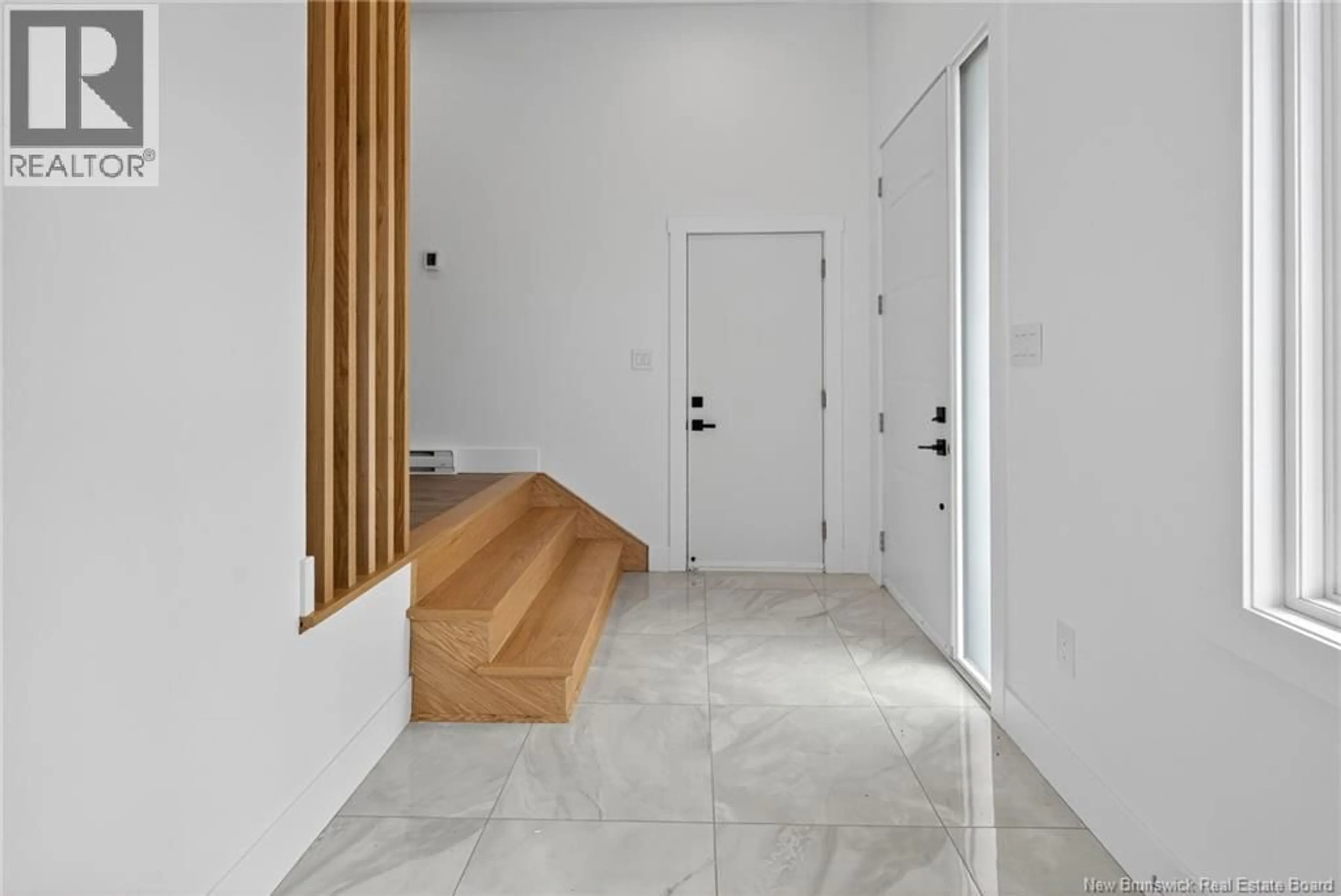 Indoor foyer for 18 WEAVERS WAY, Fredericton New Brunswick E3A3P8