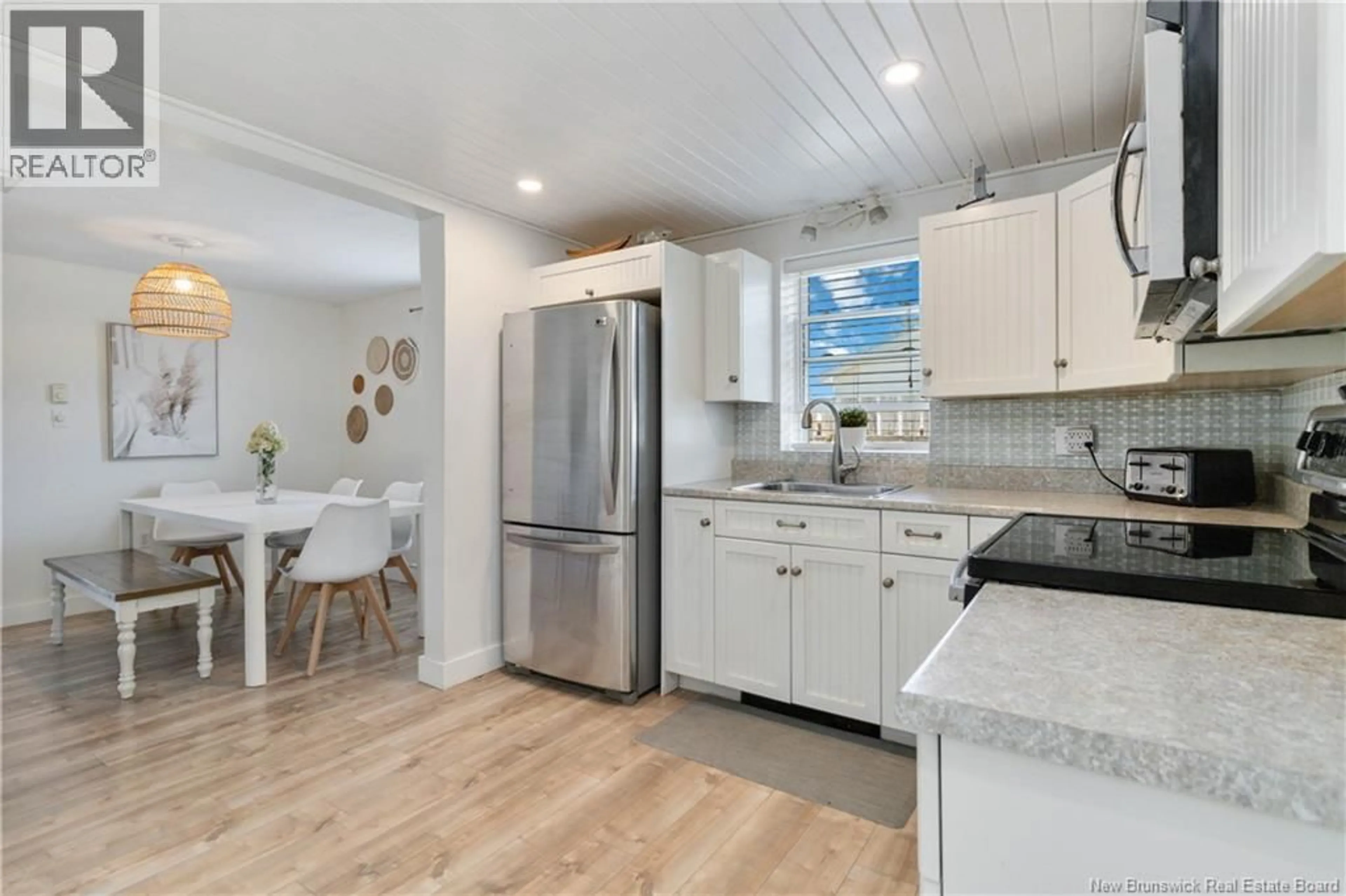 Open concept kitchen, ceramic/tile floor for 16 RAILWAY AVENUE, Shediac New Brunswick E4P4Y5