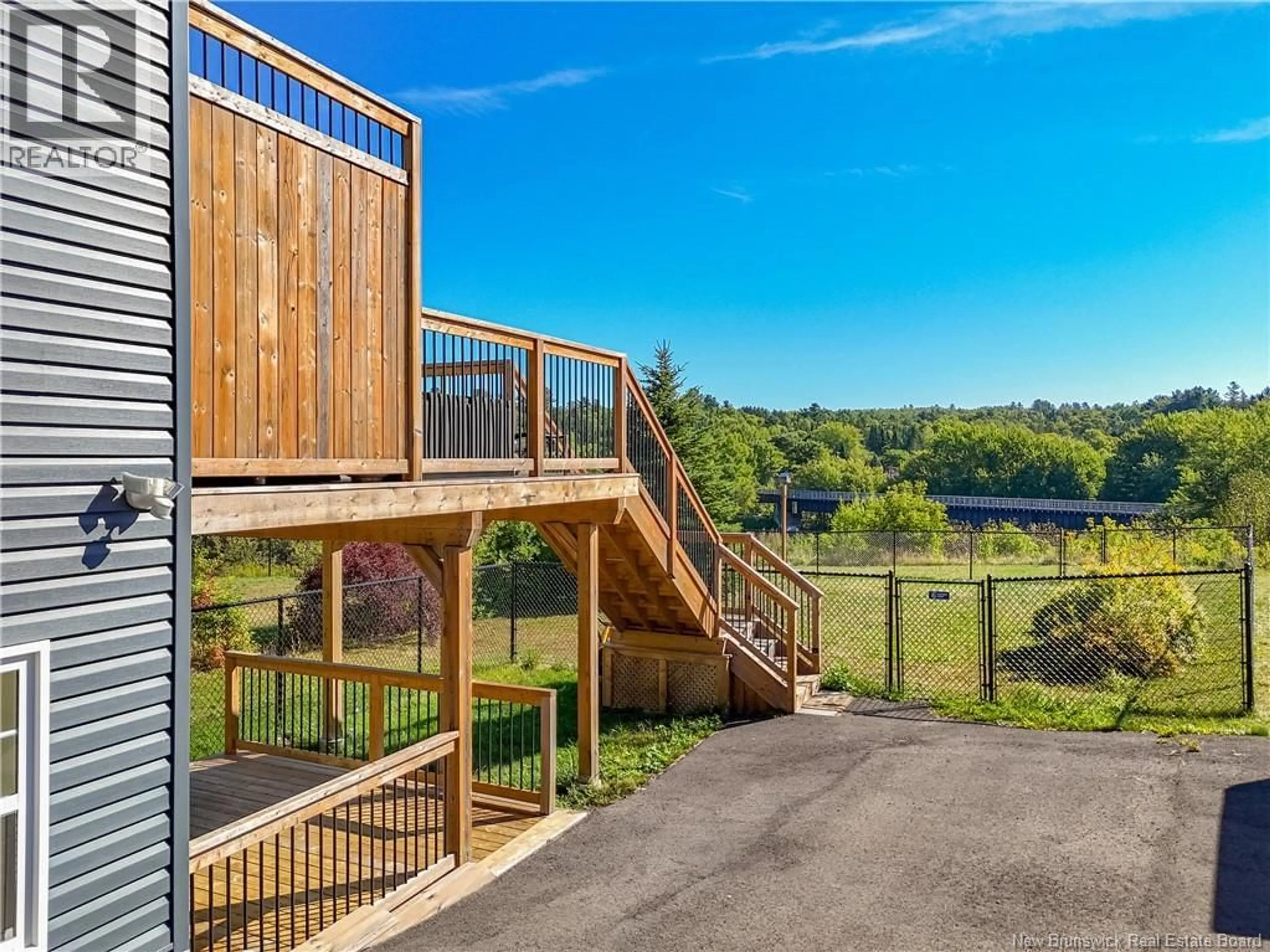 A pic from outside/outdoor area/front of a property/back of a property/a pic from drone, water/lake/river/ocean view for 570 CANADA STREET, Fredericton New Brunswick E3A4A7