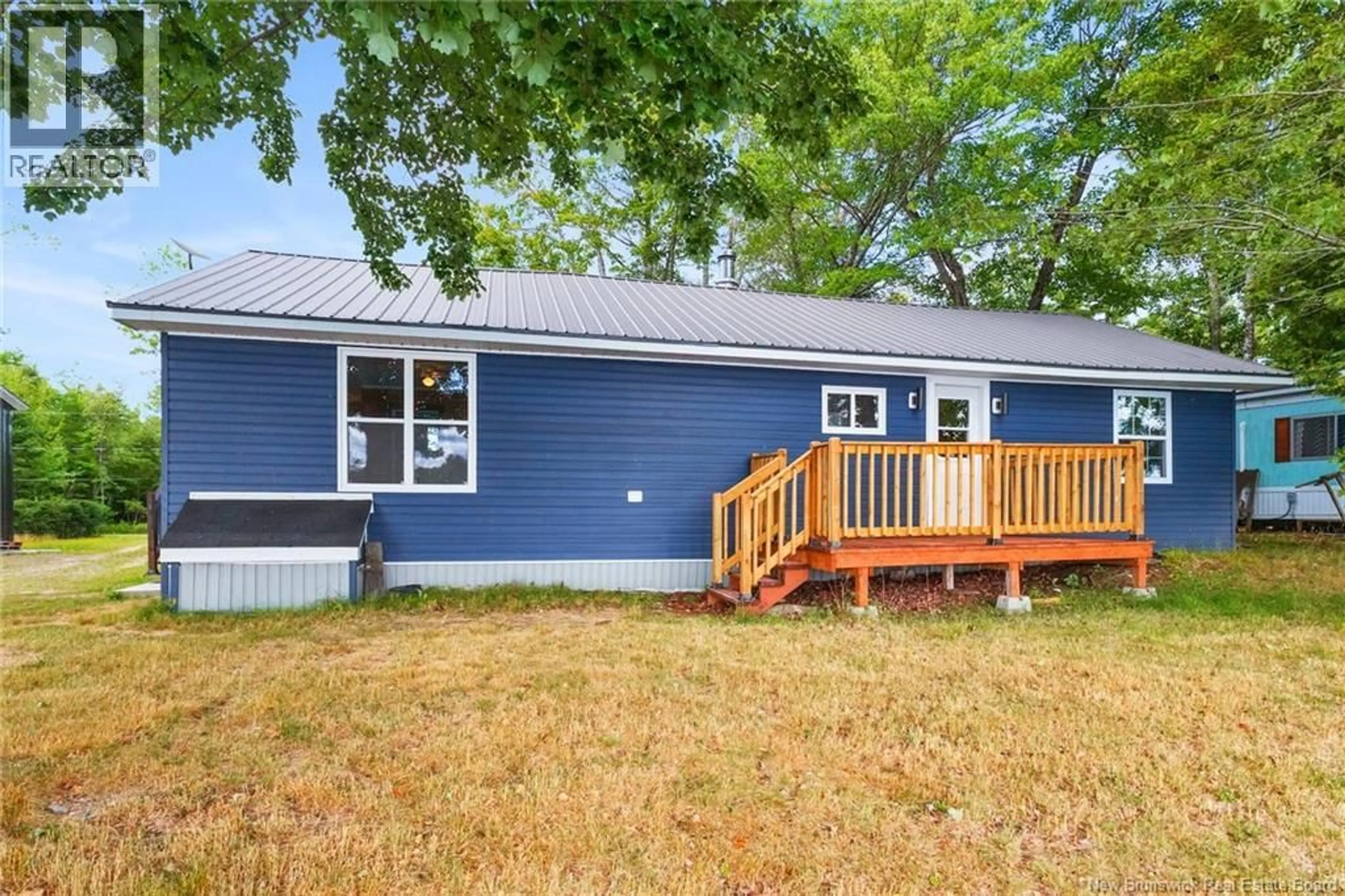 Home with vinyl exterior material, street for 52 LOON LANE, Lake George New Brunswick E6K3J1