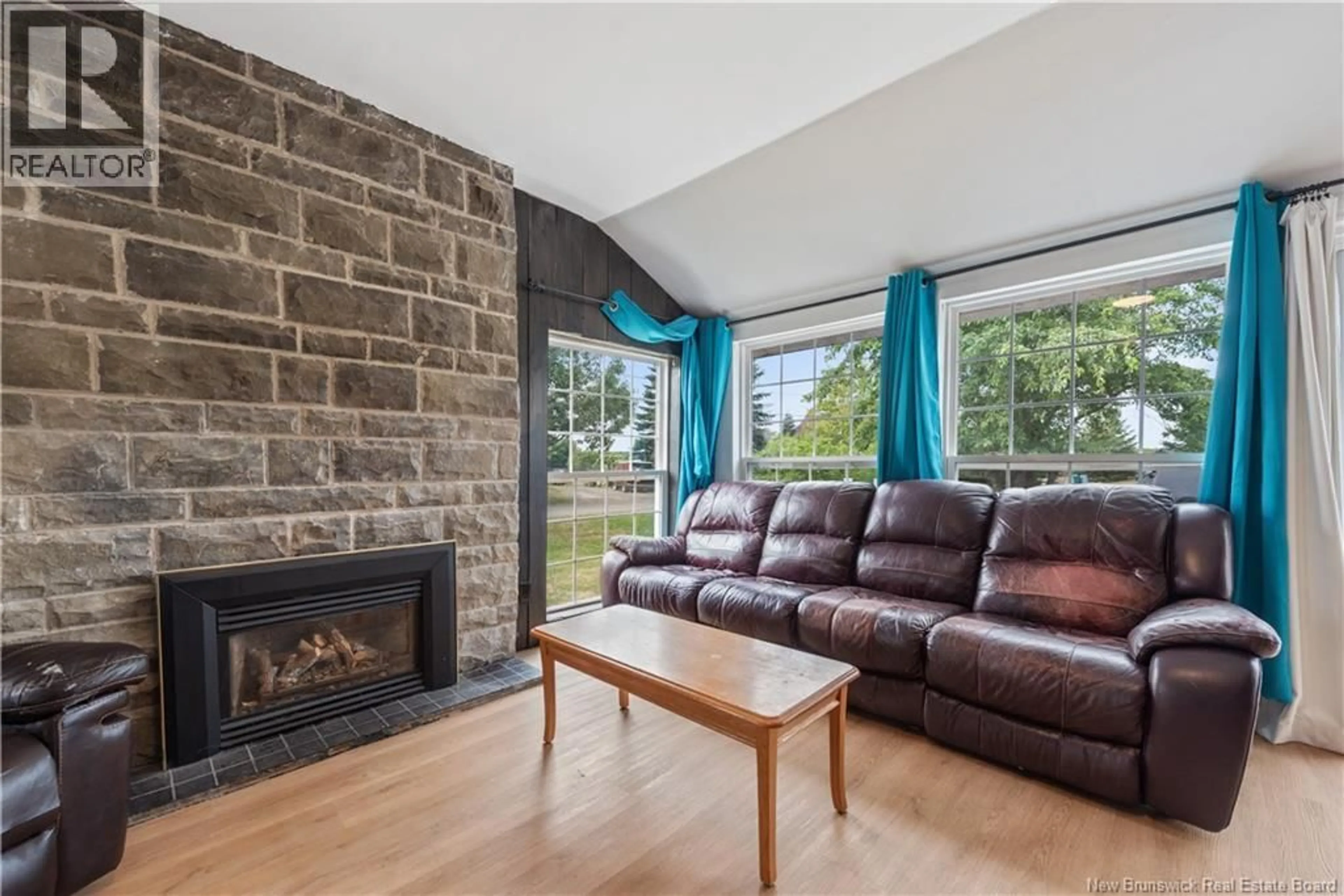 Living room with furniture, wood/laminate floor for 23 SUNSET LANE, Shediac New Brunswick E4P5H2