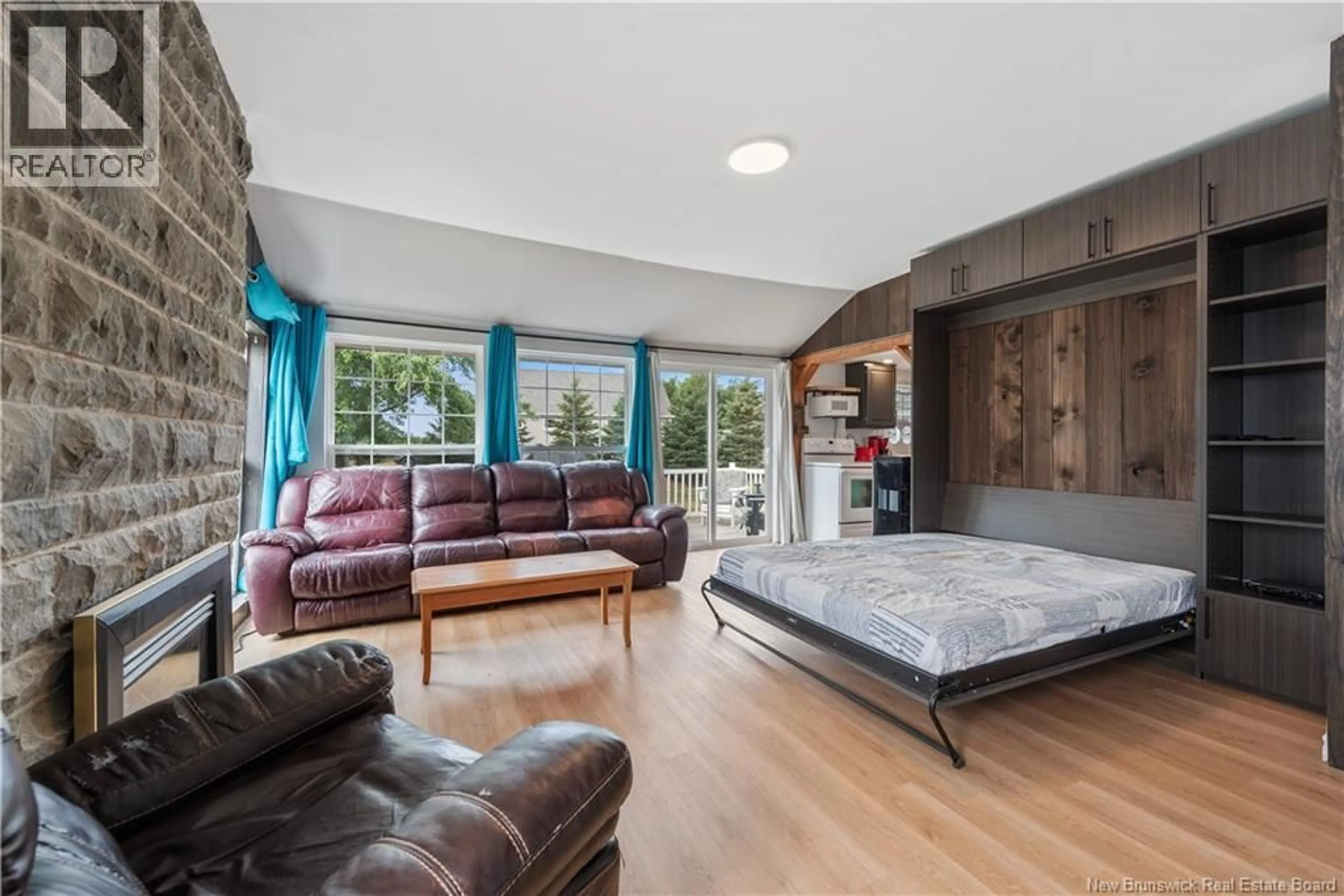Living room with furniture, wood/laminate floor for 23 SUNSET LANE, Shediac New Brunswick E4P5H2