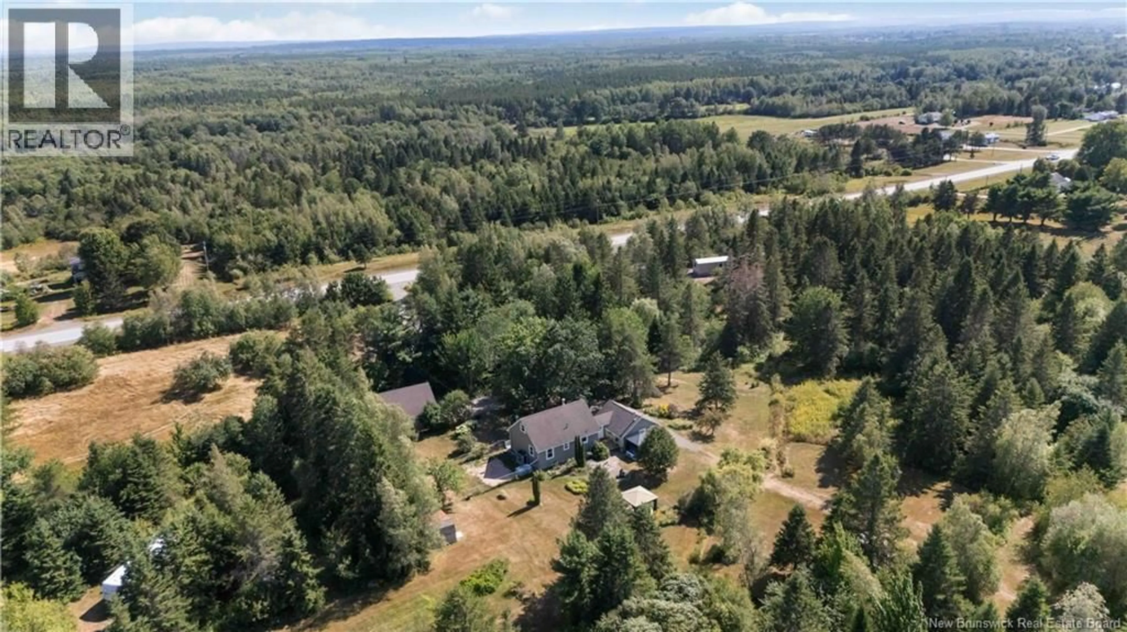 A pic from outside/outdoor area/front of a property/back of a property/a pic from drone, forest/trees view for 4365 RTE 106, Petitcodiac New Brunswick E4Z3K2