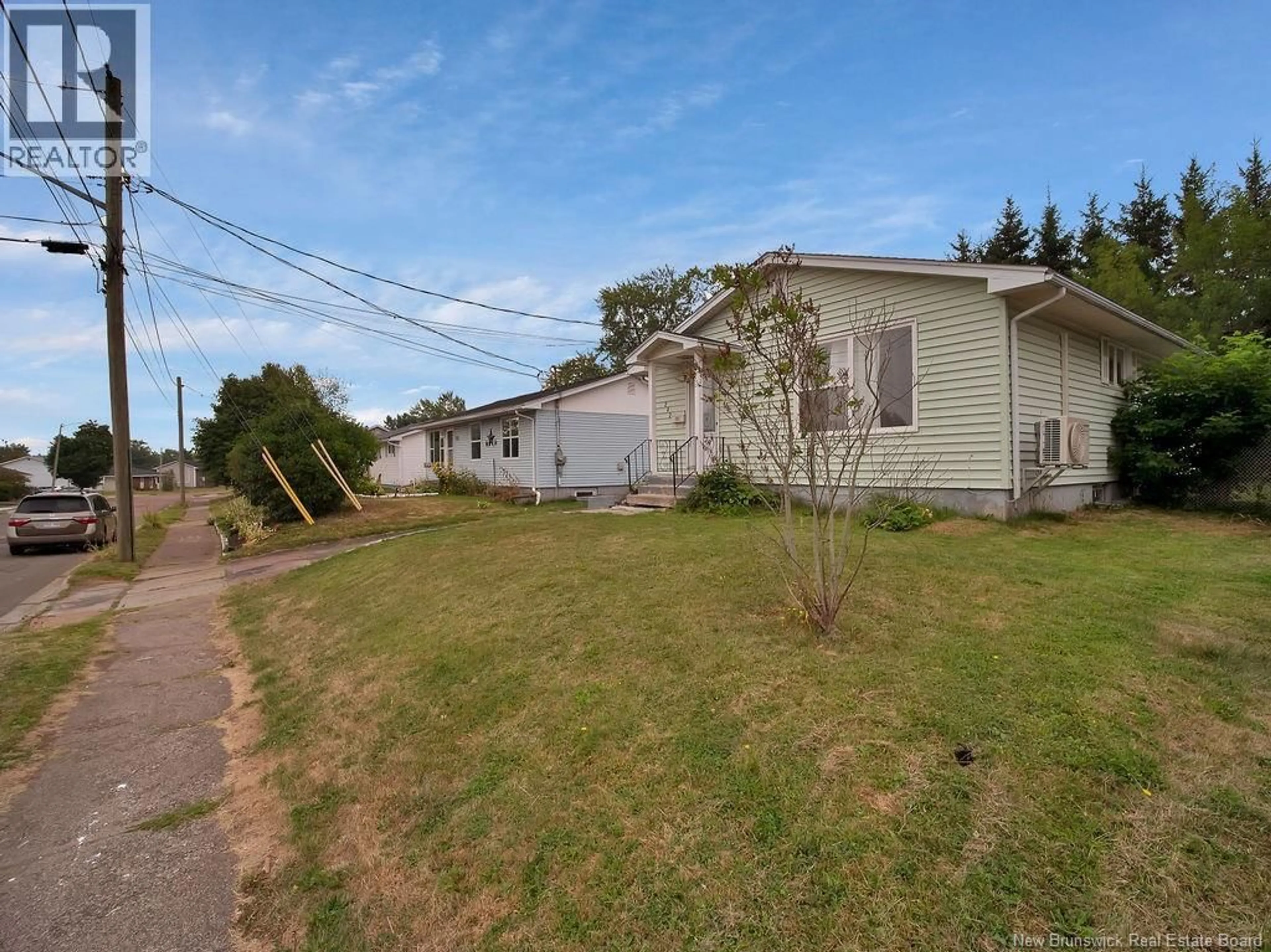 A pic from outside/outdoor area/front of a property/back of a property/a pic from drone, street for 202 NOEL STREET, Moncton New Brunswick E1C4G4