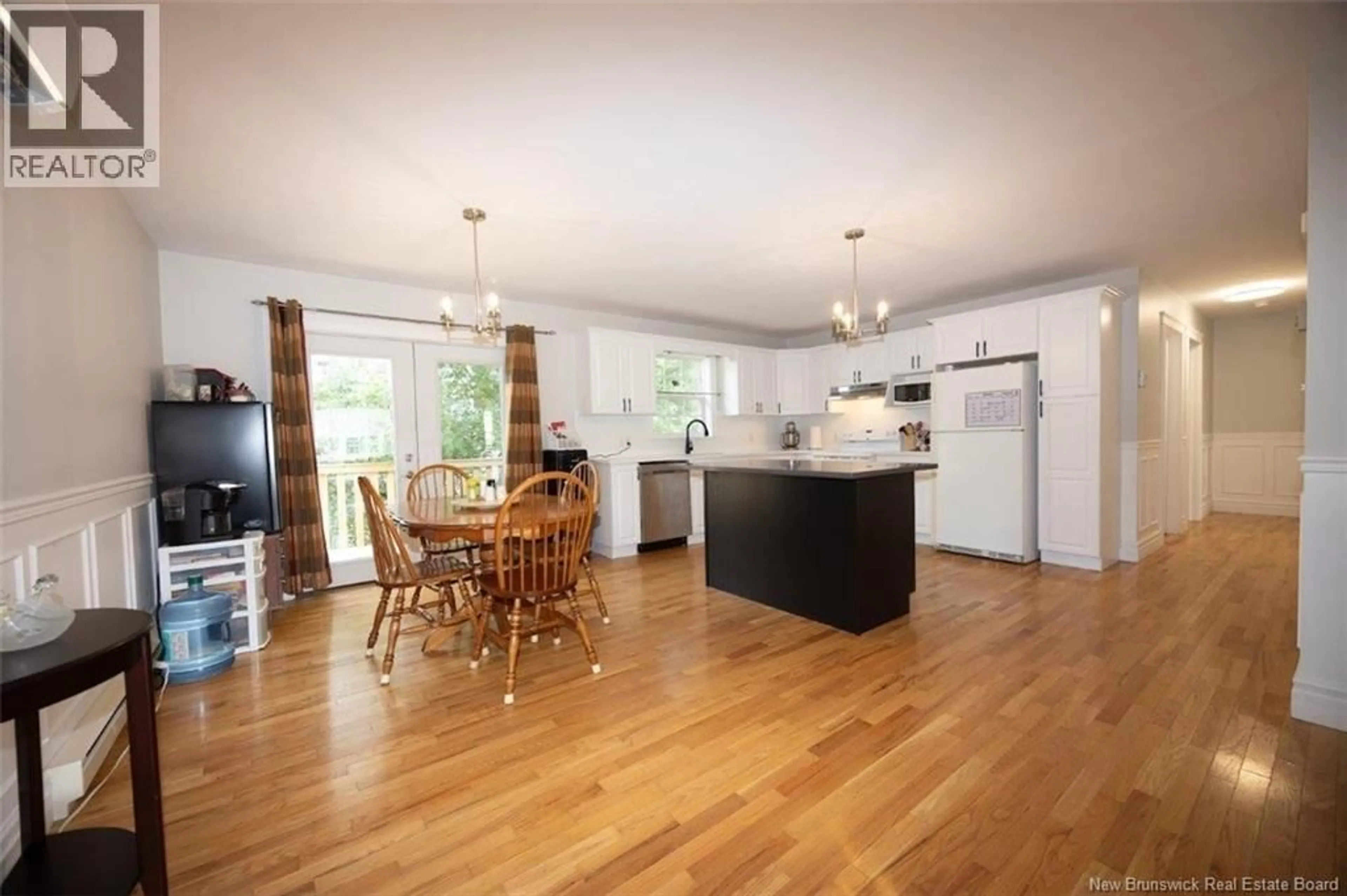 Open concept kitchen, wood/laminate floor for 4 HAYWARD COURT, Fredericton New Brunswick E3A0A4