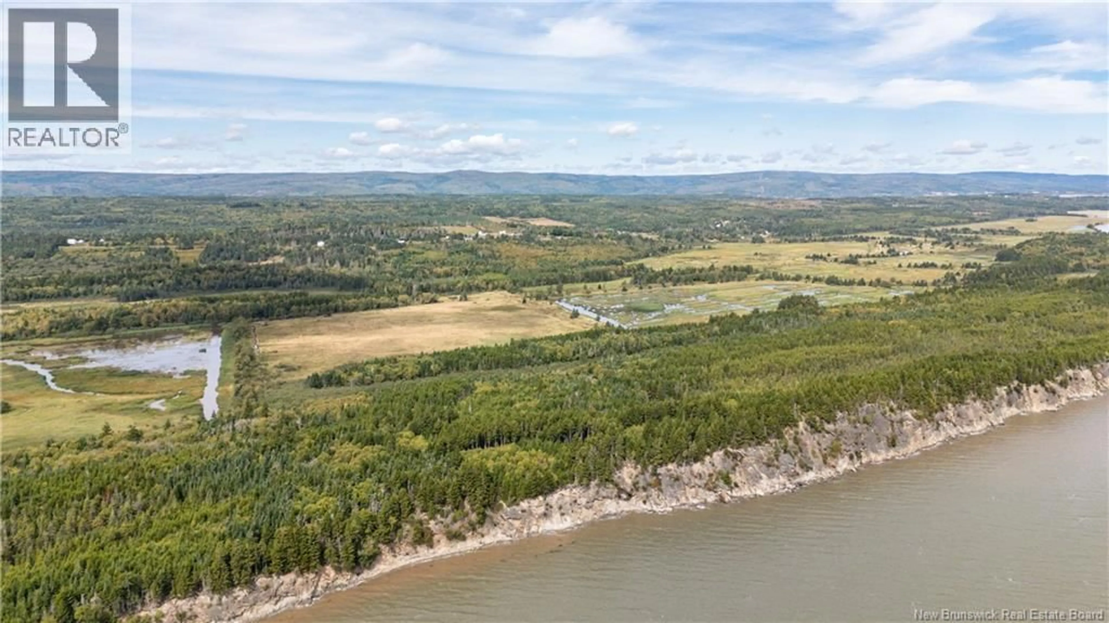 A pic from outside/outdoor area/front of a property/back of a property/a pic from drone, water/lake/river/ocean view for 899 ROUTE 915, New Horton New Brunswick E4H3S9