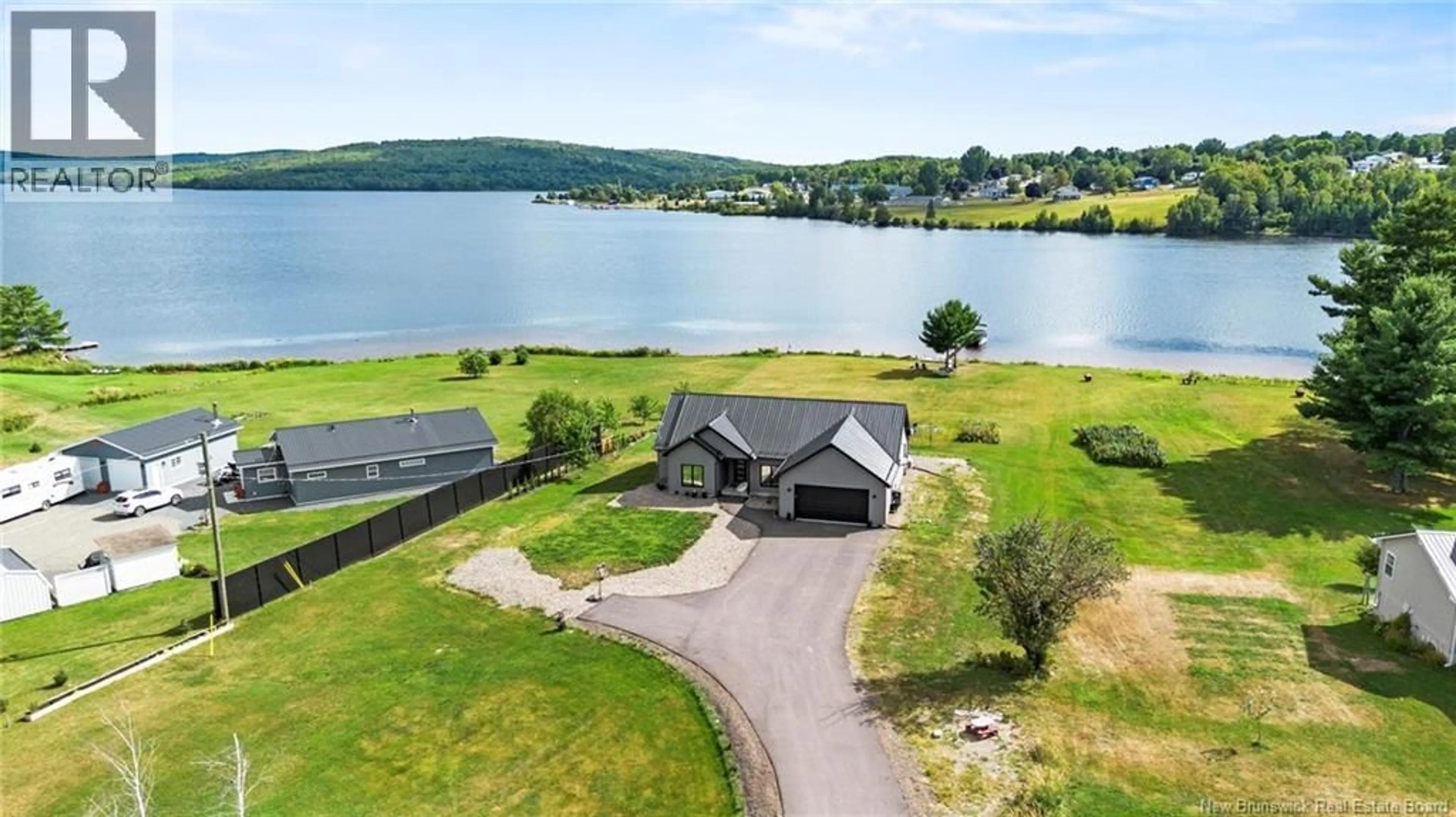 A pic from outside/outdoor area/front of a property/back of a property/a pic from drone, water/lake/river/ocean view for 723 ROUTE 105, Nackawic New Brunswick E6G1V4