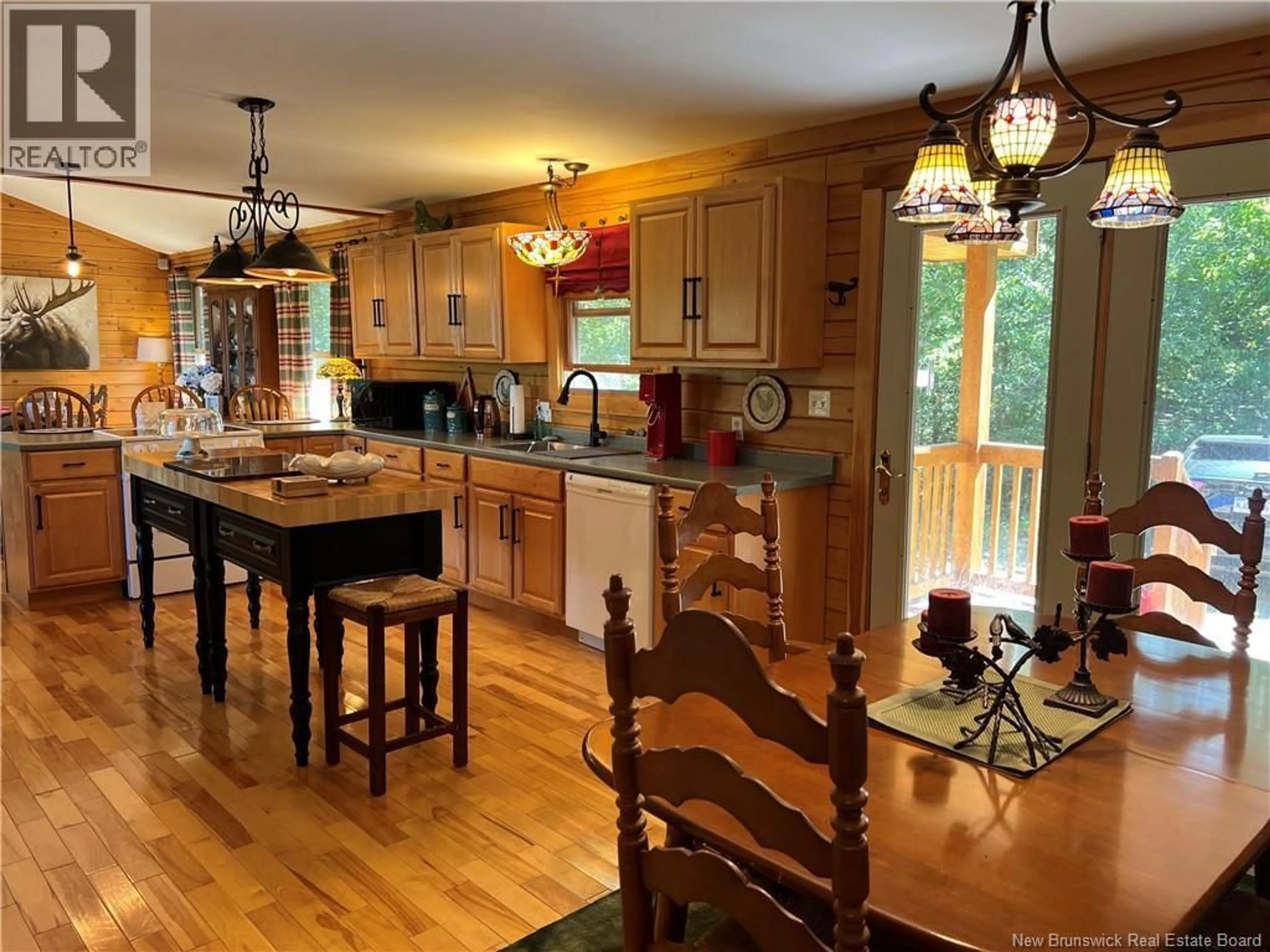 Open concept kitchen, wood/laminate floor for 389 BUNKER HILL ROAD, Wilsons Beach New Brunswick E5E1M4