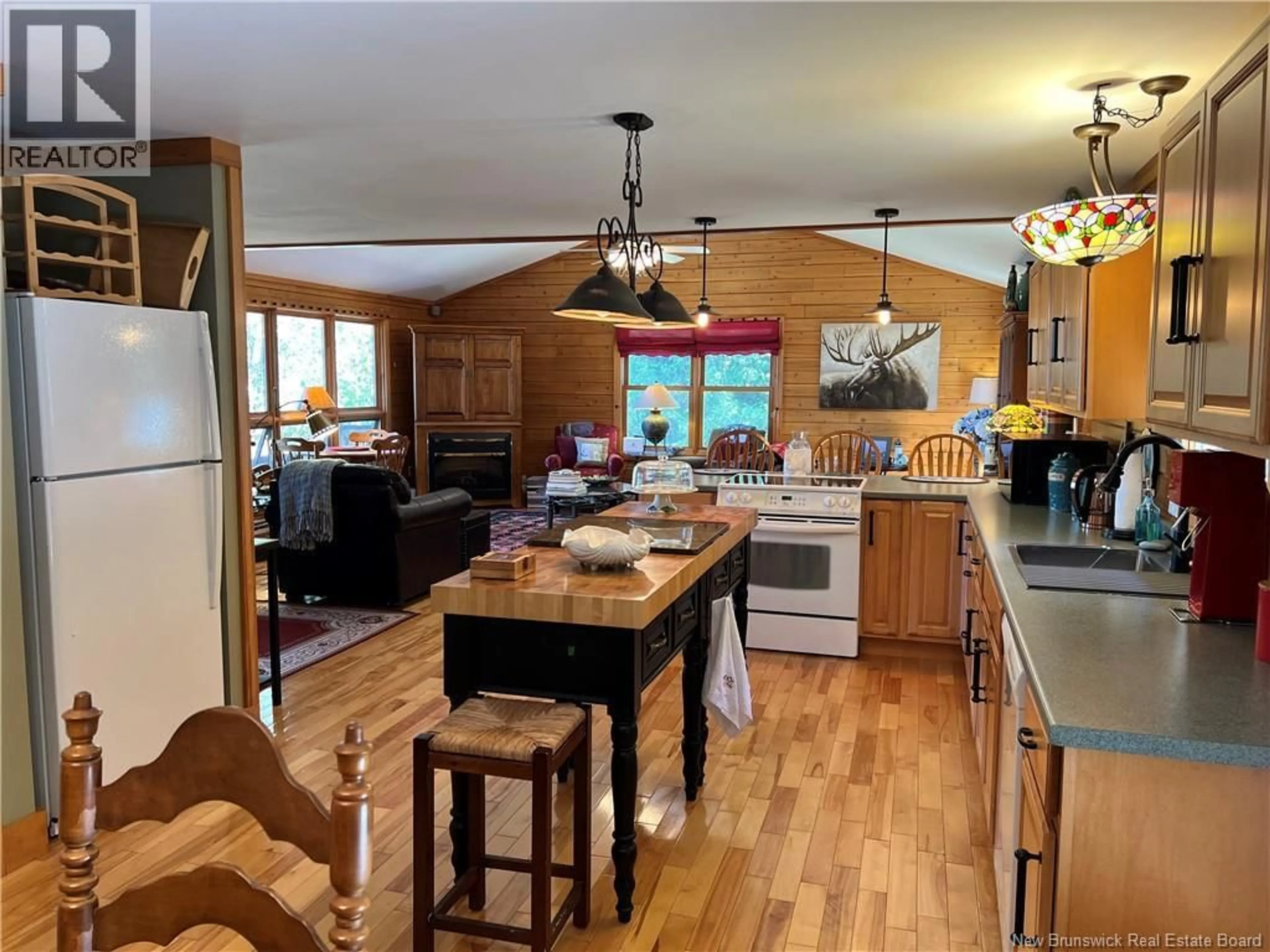 Open concept kitchen, wood/laminate floor for 389 BUNKER HILL ROAD, Wilsons Beach New Brunswick E5E1M4