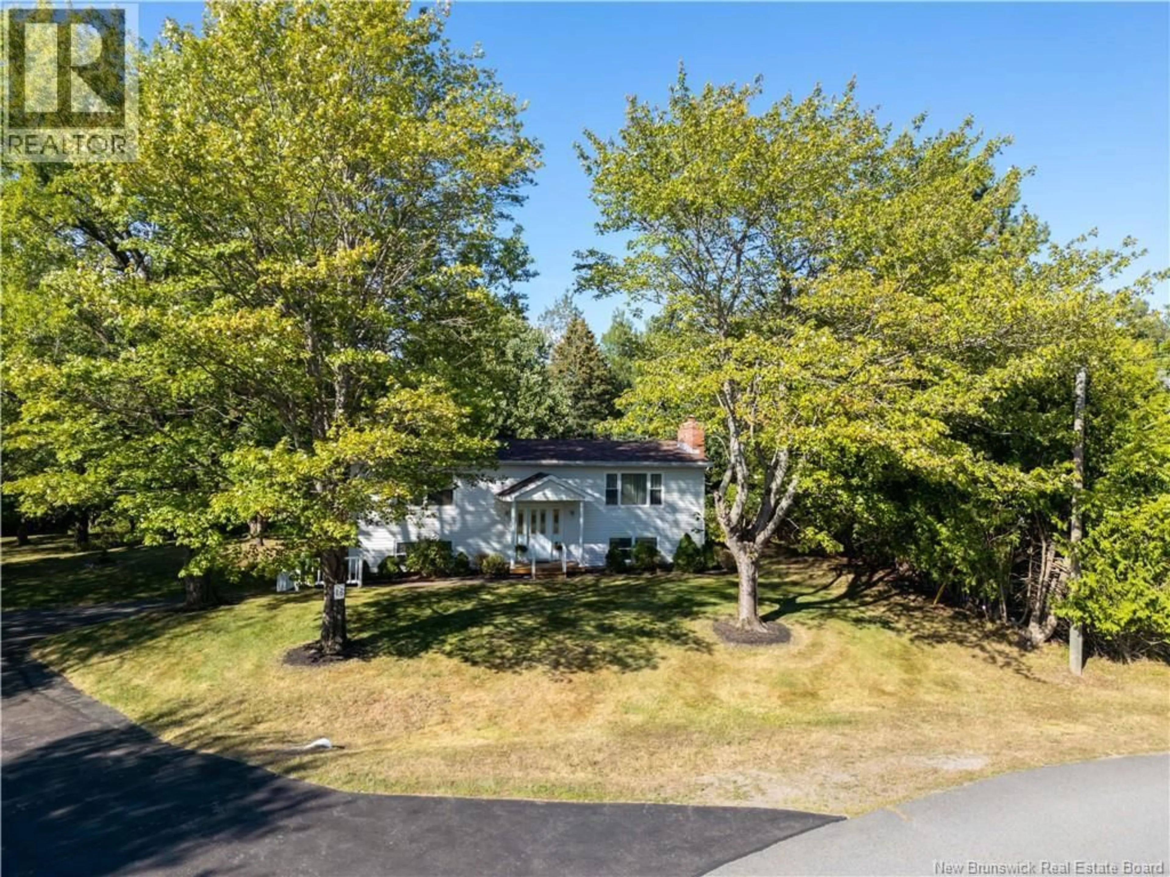 A pic from outside/outdoor area/front of a property/back of a property/a pic from drone, street for 16 LONGWOOD DRIVE, Quispamsis New Brunswick E2E2S7