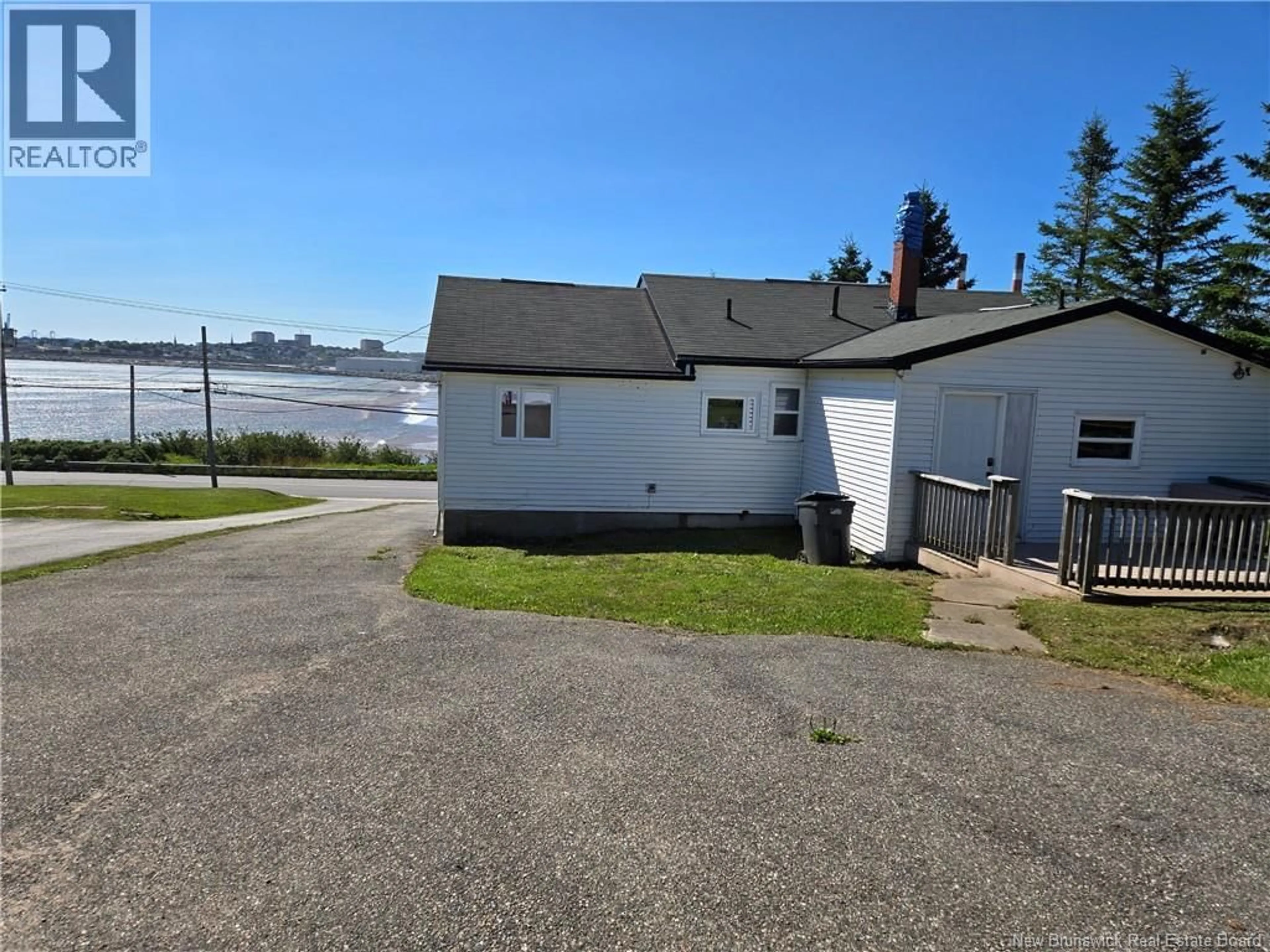 A pic from outside/outdoor area/front of a property/back of a property/a pic from drone, water/lake/river/ocean view for 101 RED HEAD ROAD, Saint John New Brunswick E2S1P5