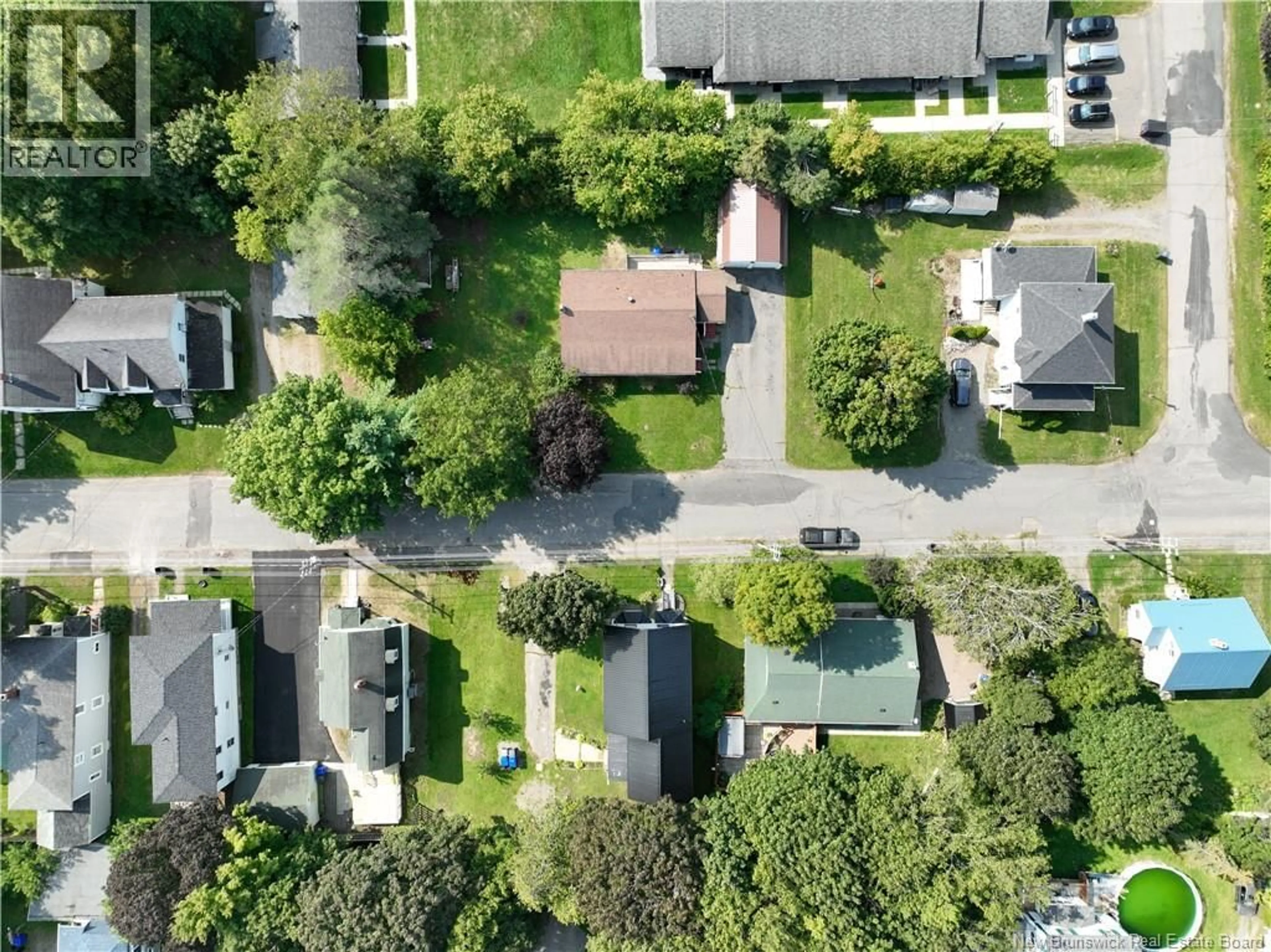 A pic from outside/outdoor area/front of a property/back of a property/a pic from drone, street for 14 VEAZEY STREET, St. Stephen New Brunswick E3L2R8