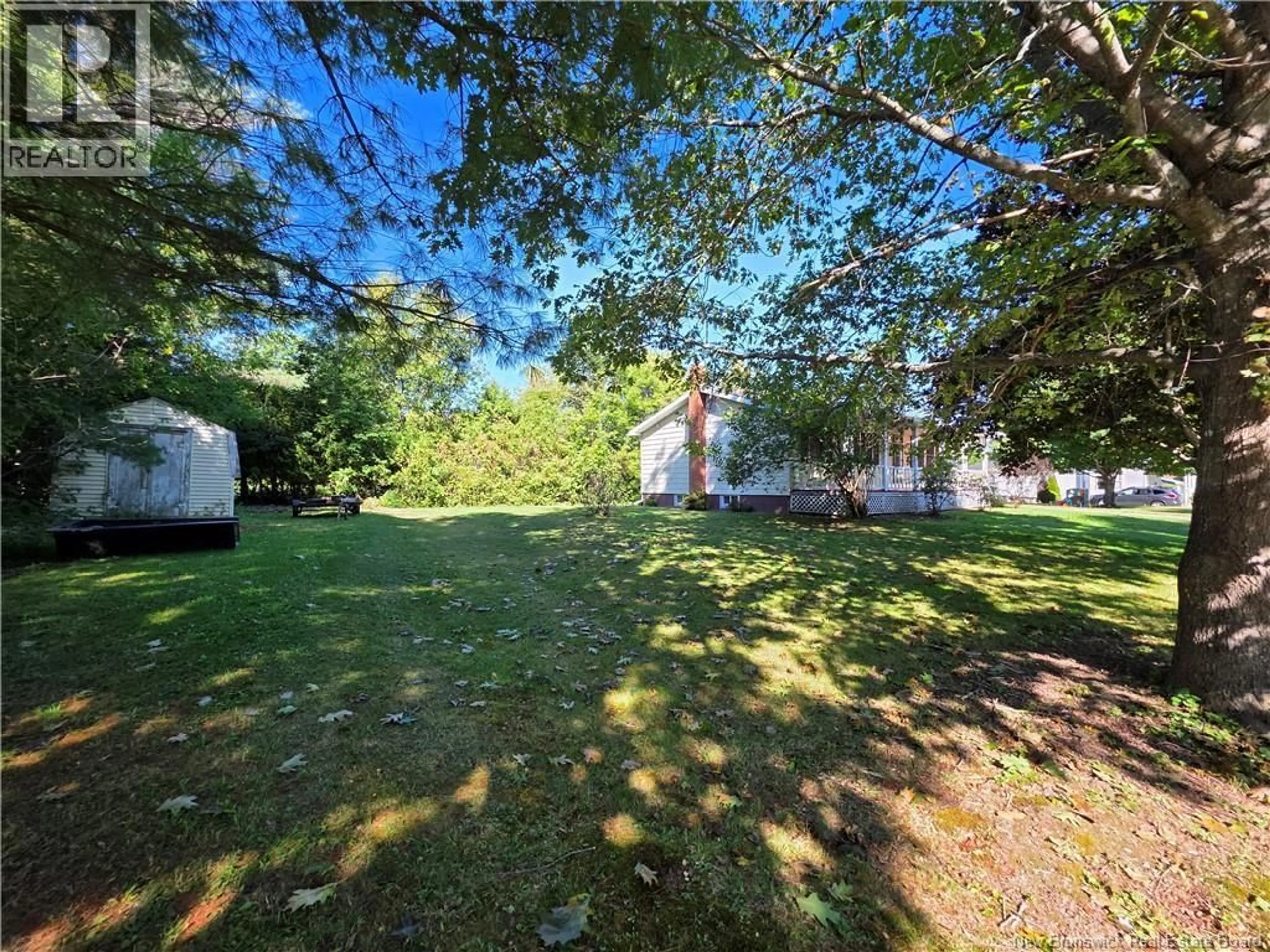 A pic from outside/outdoor area/front of a property/back of a property/a pic from drone, forest/trees view for 14 VEAZEY STREET, St. Stephen New Brunswick E3L2R8