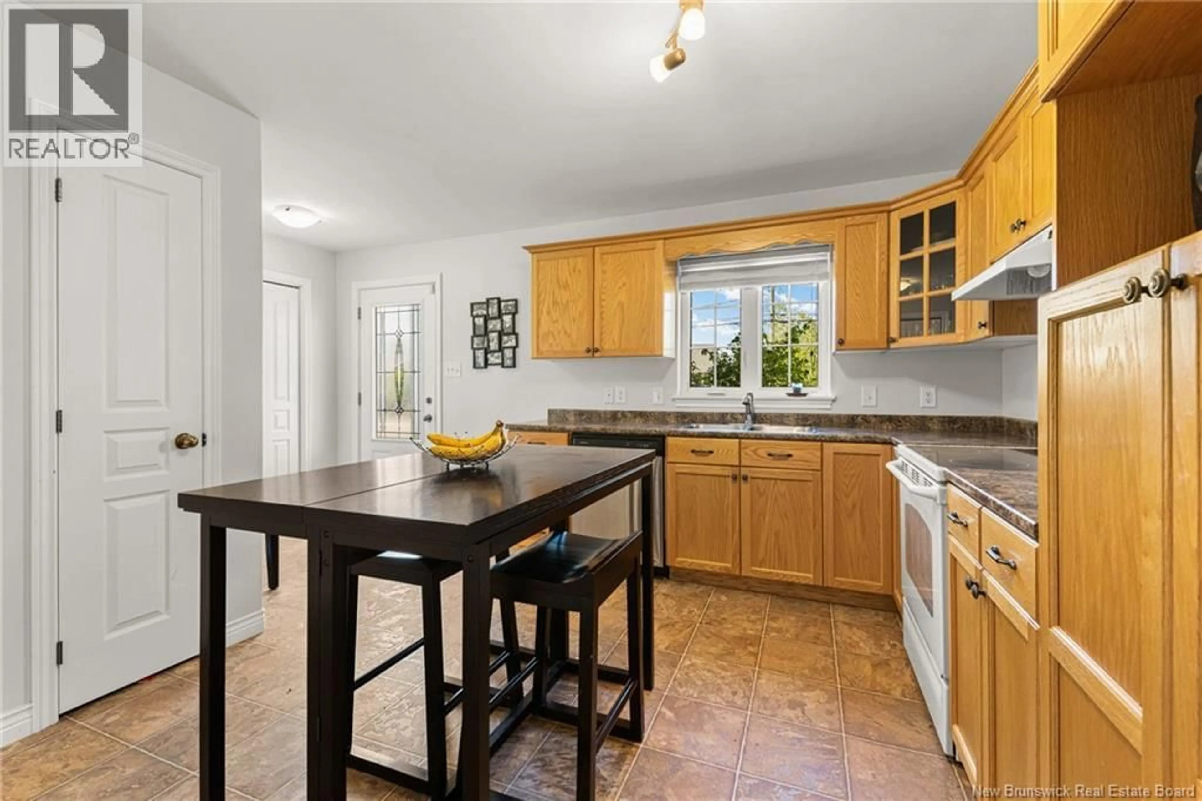 Open concept kitchen, ceramic/tile floor for 137 DAMIEN, Dieppe New Brunswick E1A0G2