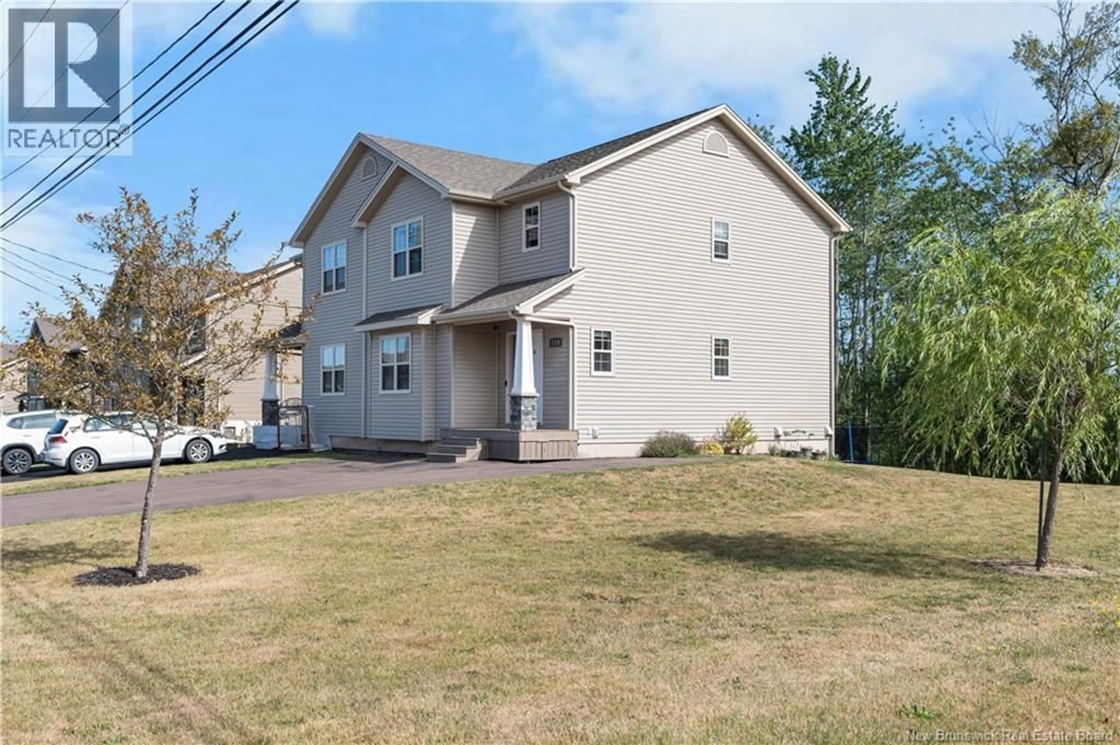 Home with vinyl exterior material, street for 218 ERINVALE DRIVE, Moncton New Brunswick E1A9S2