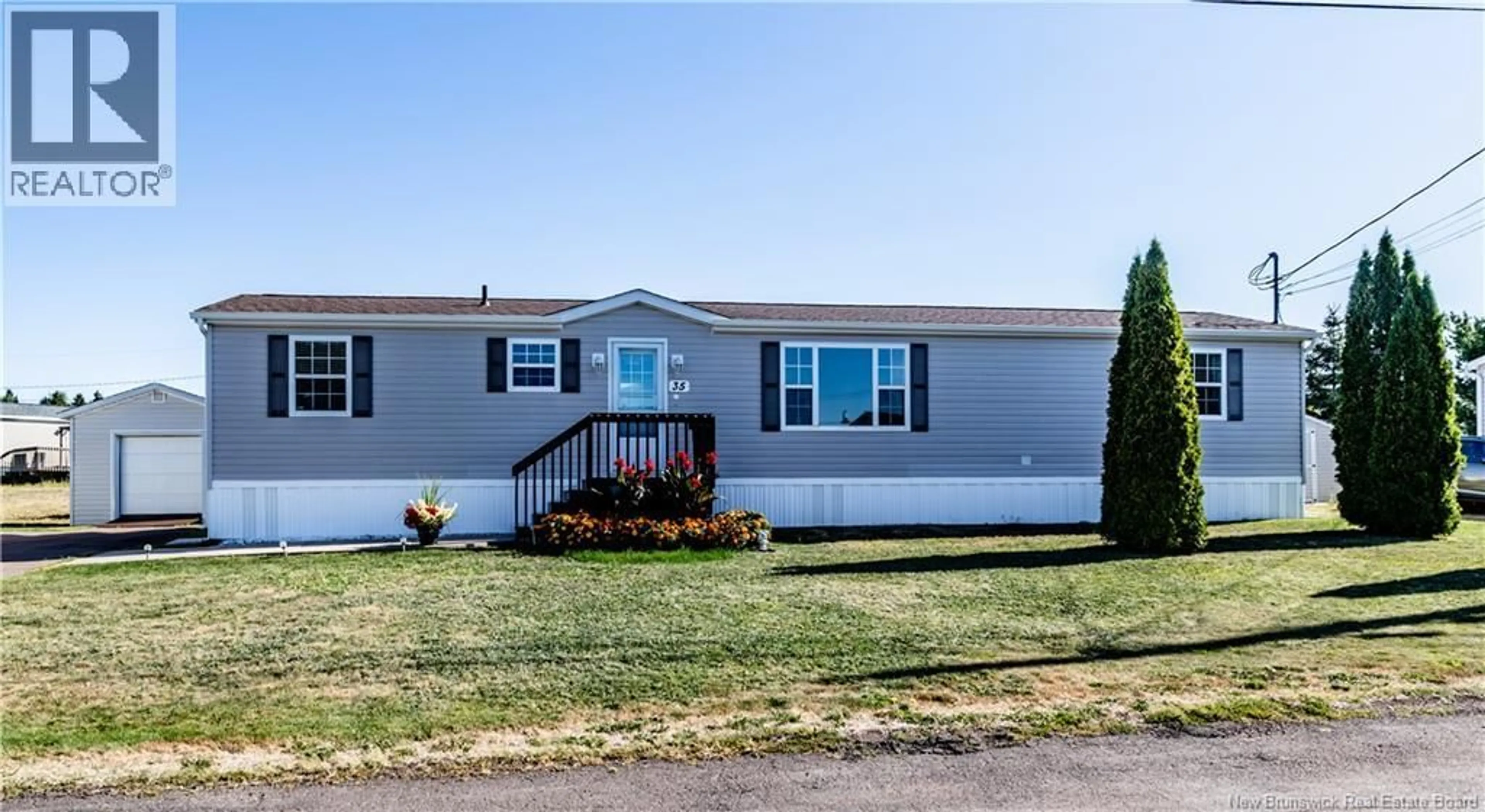 Home with vinyl exterior material, street for 35 NEPISIGUIT, Dieppe New Brunswick E1A7N1