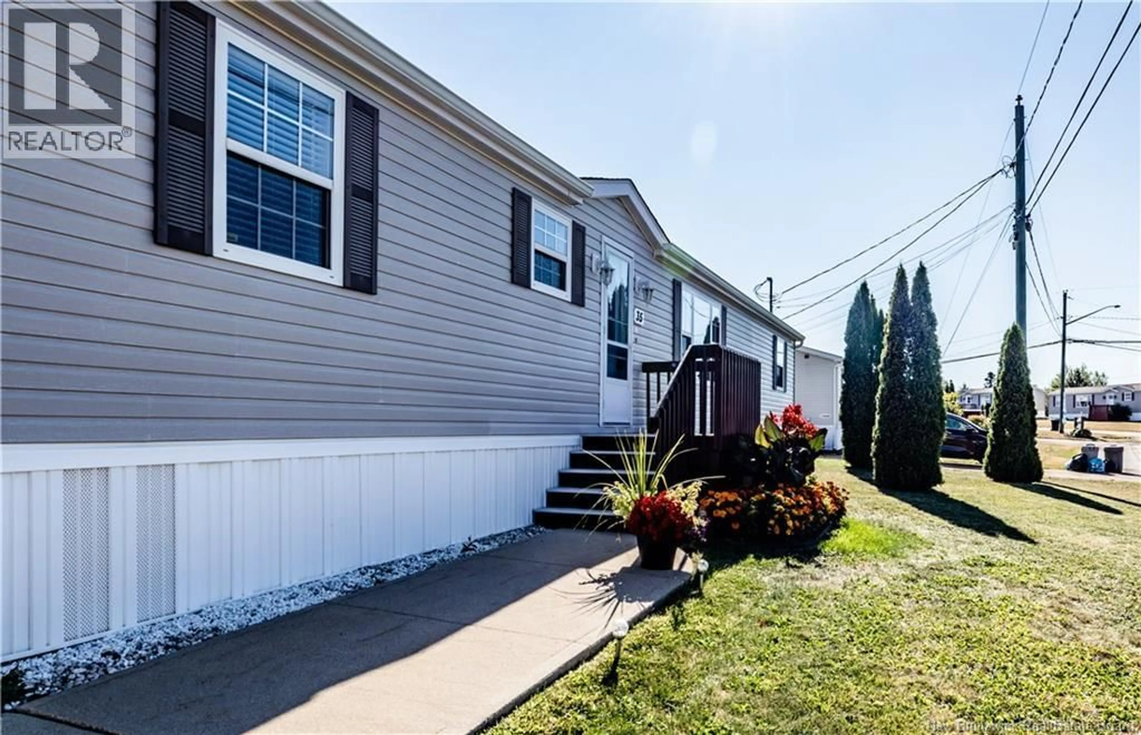 Home with vinyl exterior material, street for 35 NEPISIGUIT, Dieppe New Brunswick E1A7N1