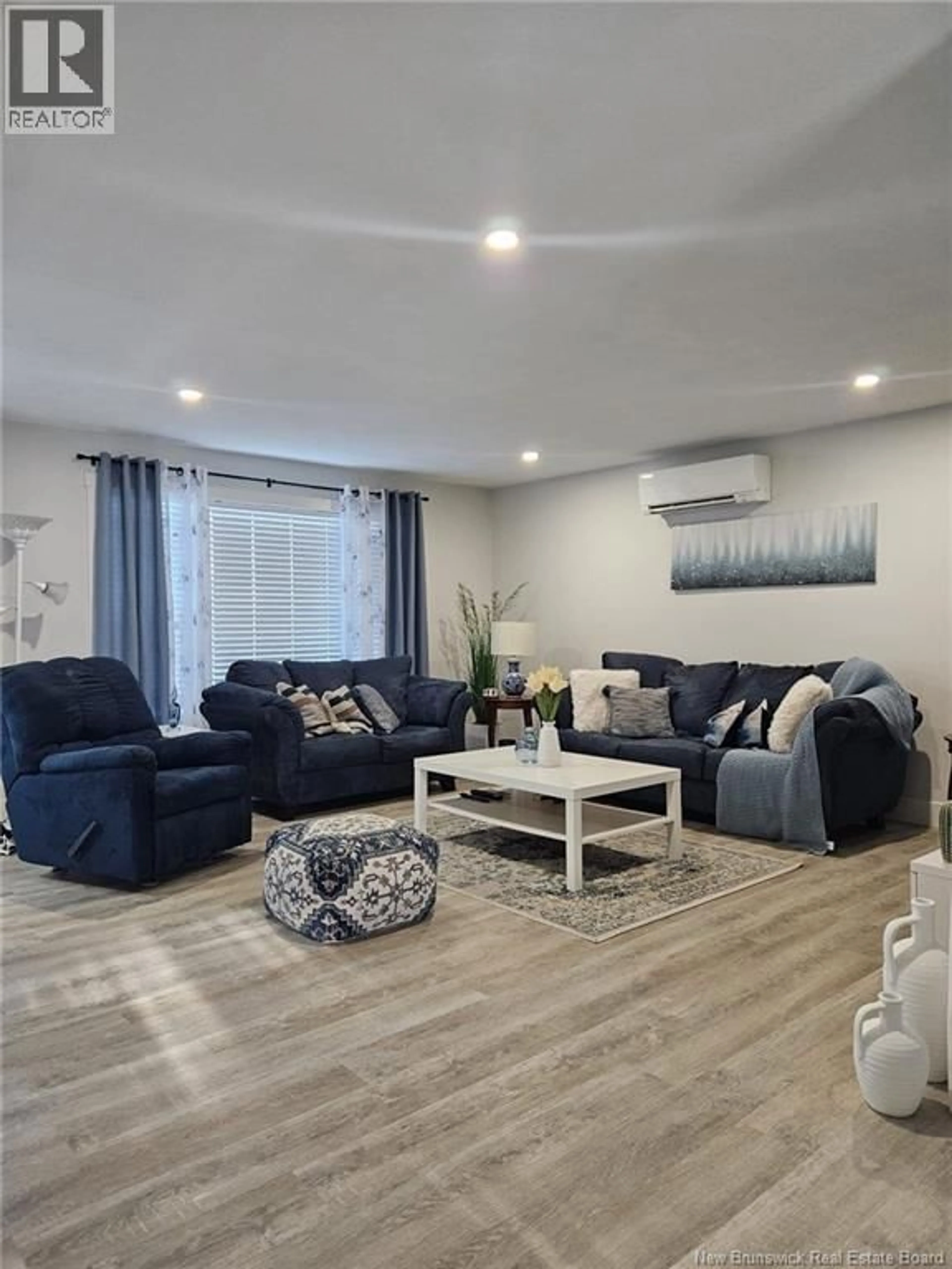 Living room with furniture, wood/laminate floor for 354 GORGE ROAD, Moncton New Brunswick E1G3H8