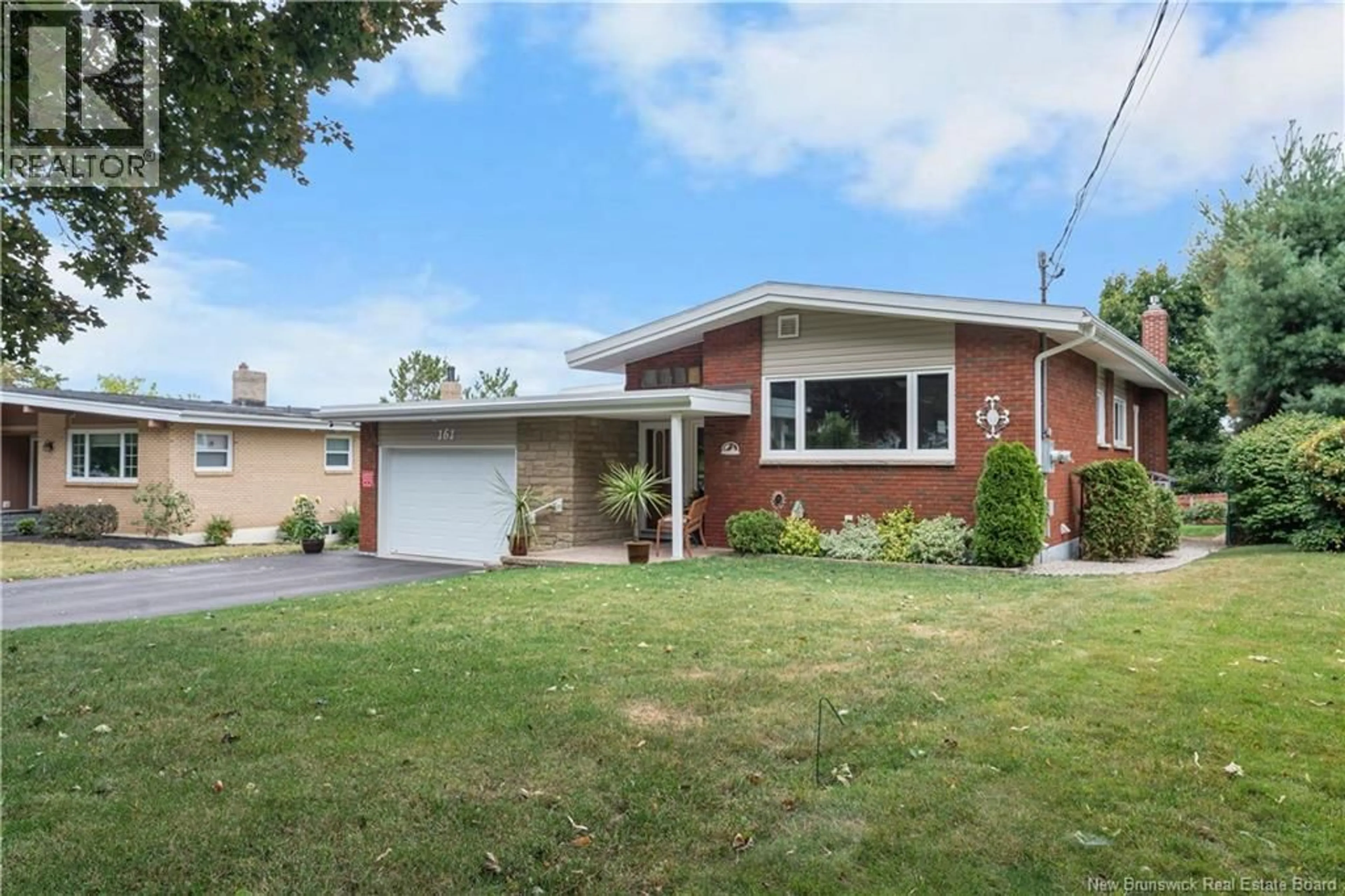 Home with brick exterior material, street for 161 HEDGEWOOD DRIVE, Moncton New Brunswick E1E2W8