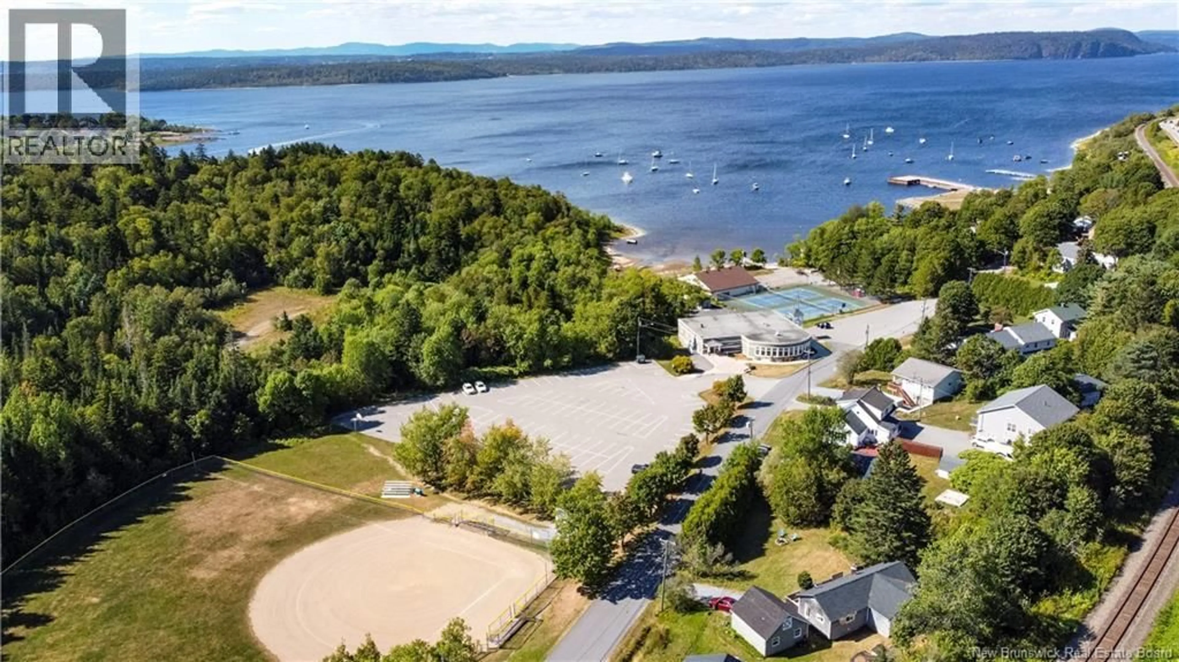 A pic from outside/outdoor area/front of a property/back of a property/a pic from drone, water/lake/river/ocean view for 74 JAMES RENFORTH DRIVE, Rothesay New Brunswick E2H1K8