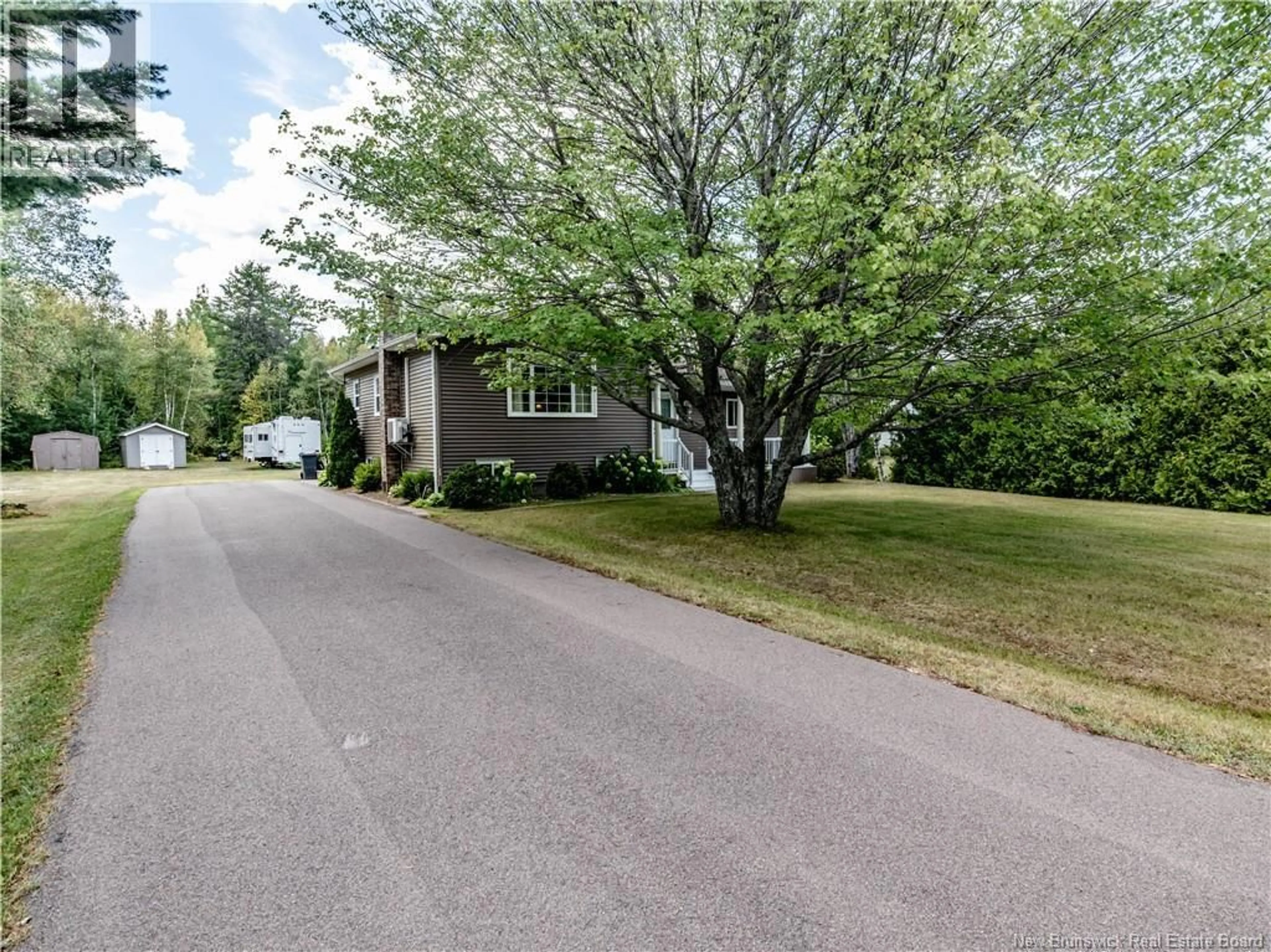 Home with vinyl exterior material, street for 938 DE LA PETITE RIVIERE, Aldouane New Brunswick E4W5C4