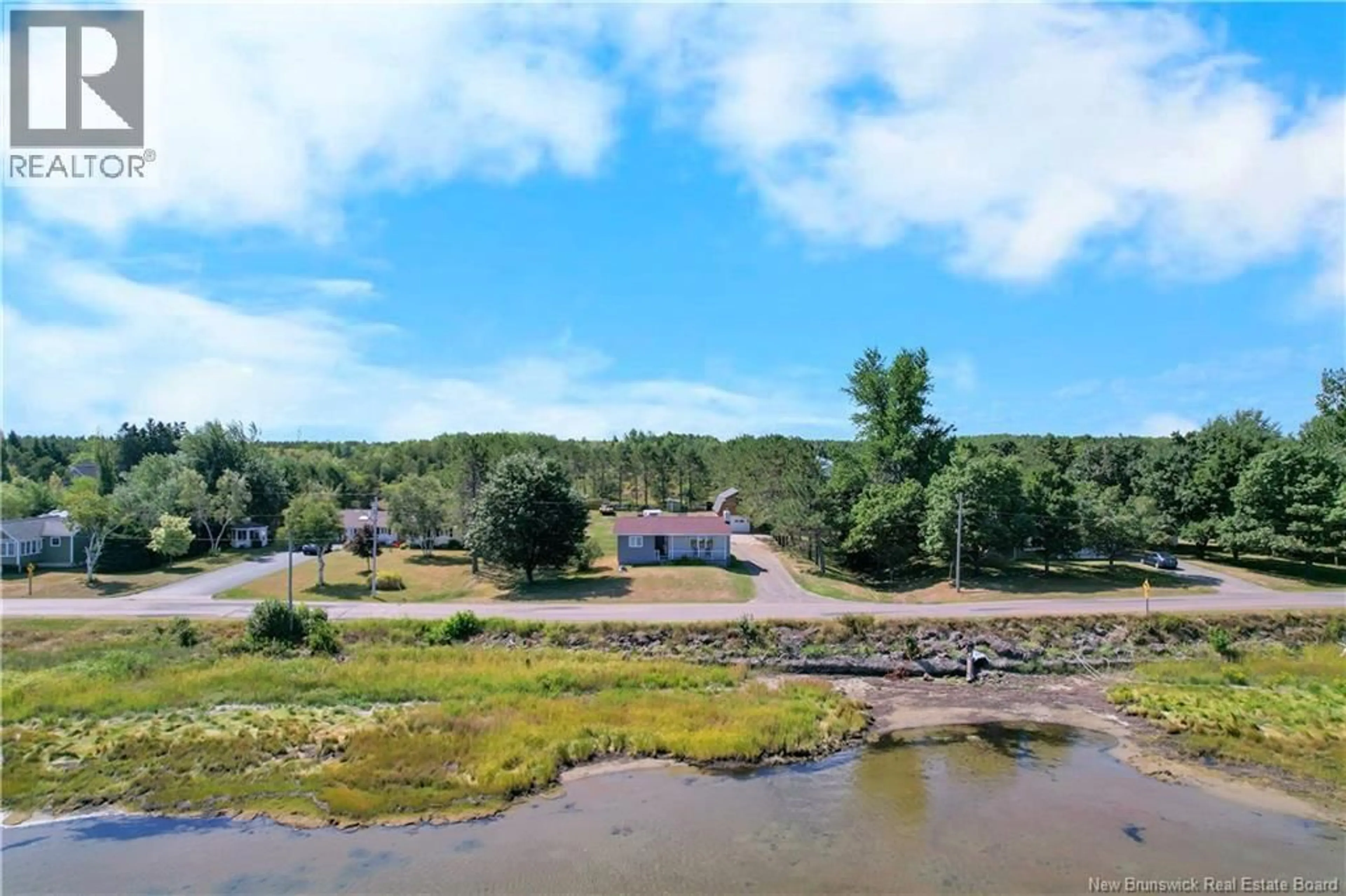 A pic from outside/outdoor area/front of a property/back of a property/a pic from drone, water/lake/river/ocean view for 142 POINTE DE L'ÉGLISE, Aldouane New Brunswick E4W5H2