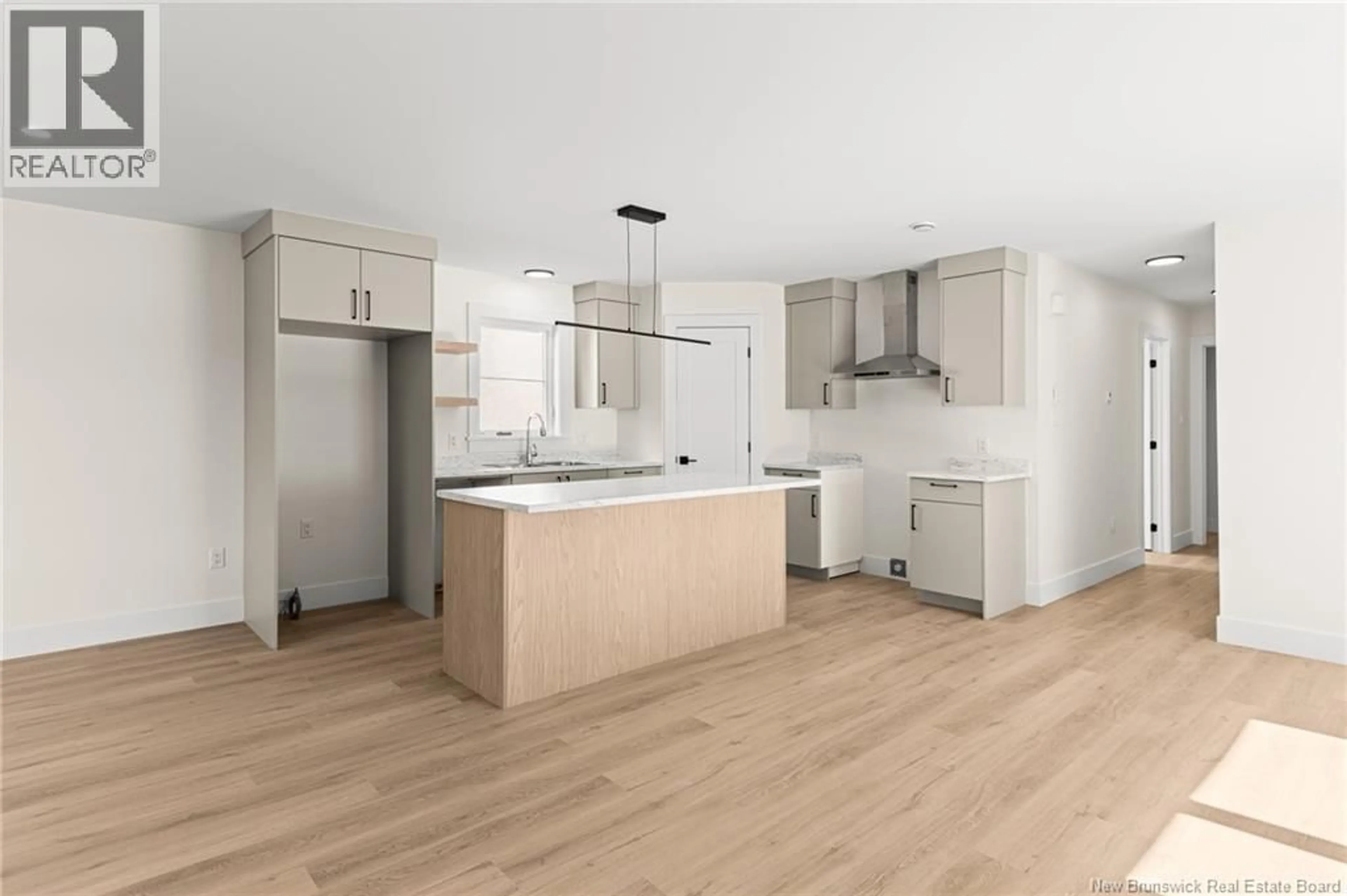 Open concept kitchen, wood/laminate floor for 220 GOULD STREET, Dieppe New Brunswick E1A1V1