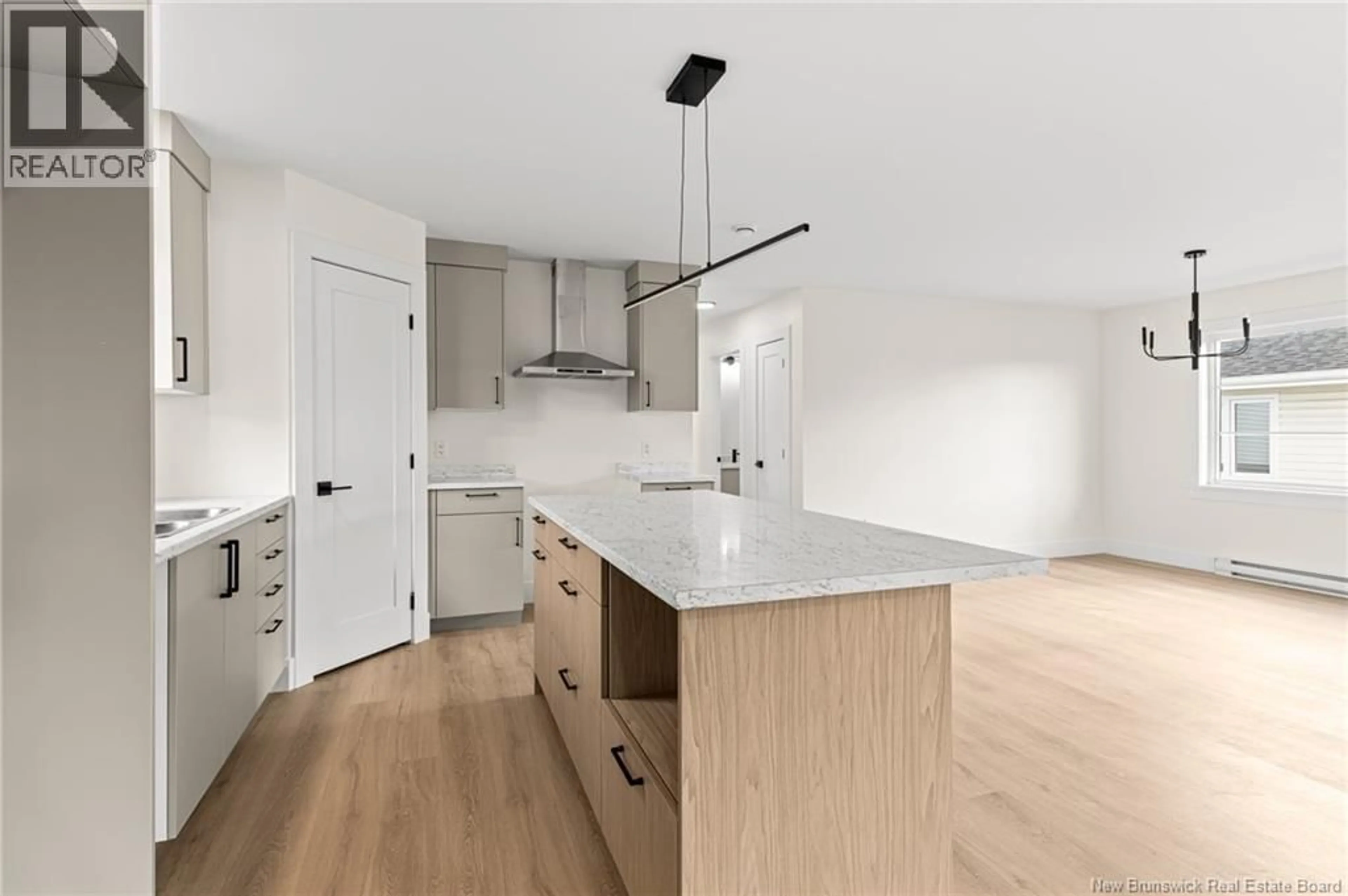Open concept kitchen, wood/laminate floor for 220 GOULD STREET, Dieppe New Brunswick E1A1V1