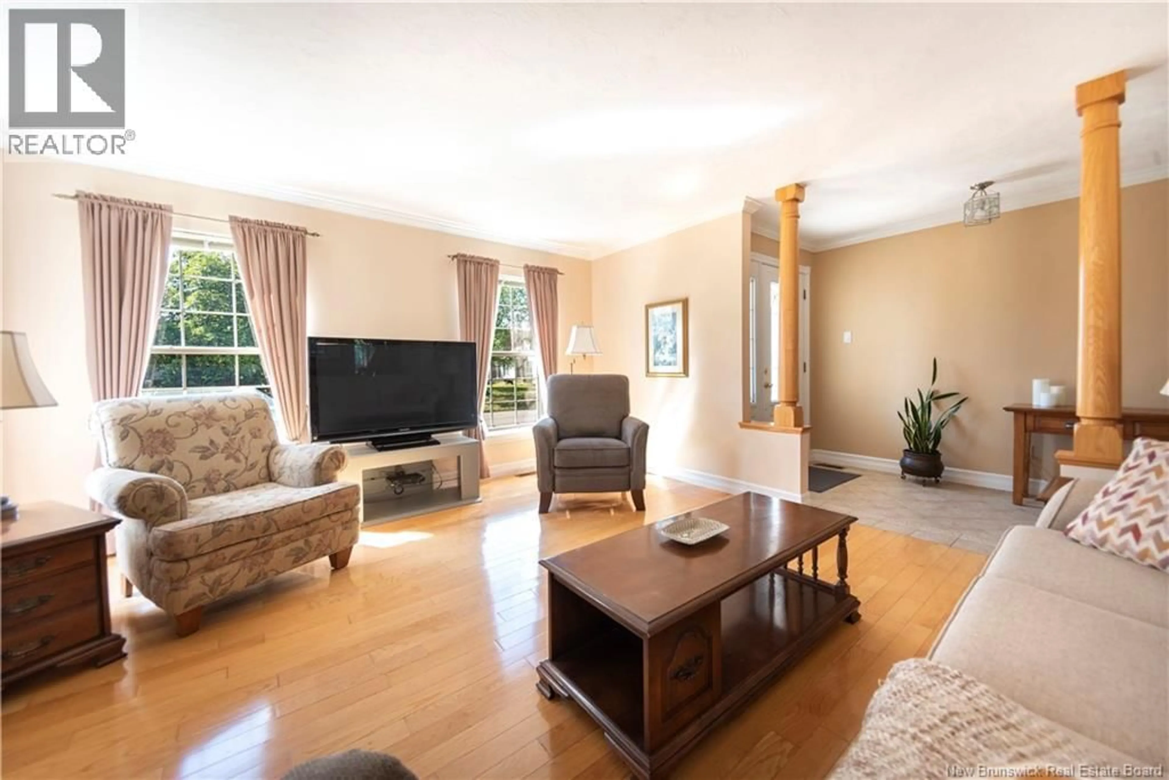 Living room with furniture, wood/laminate floor for 97 CARDIGAN LANE, Moncton New Brunswick E1C0B9