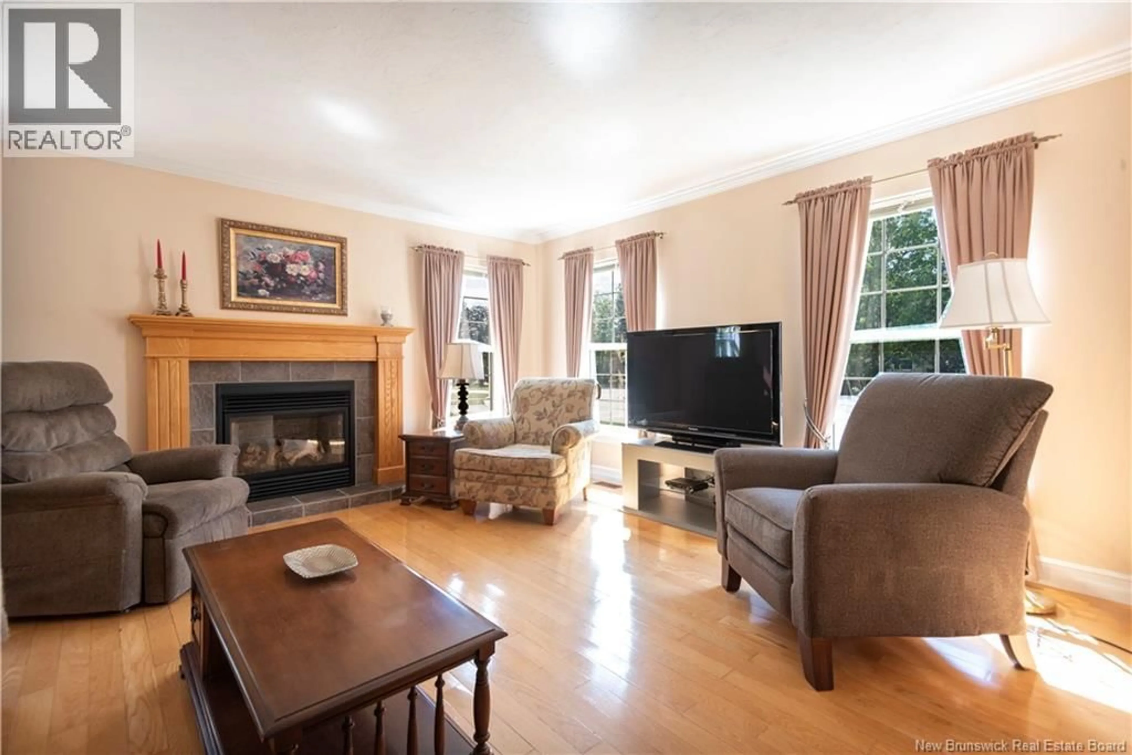 Living room with furniture, wood/laminate floor for 97 CARDIGAN LANE, Moncton New Brunswick E1C0B9