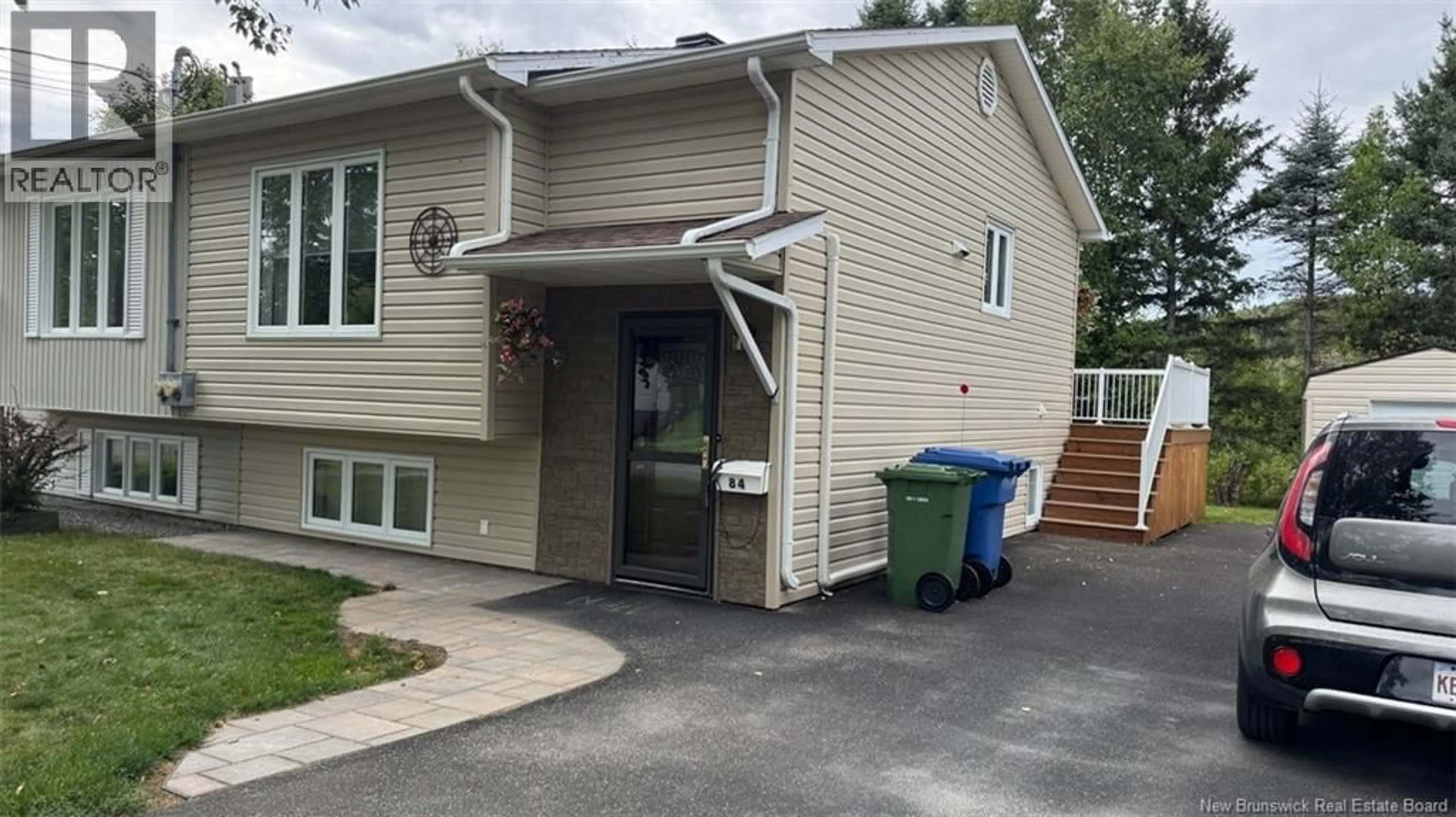 Home with vinyl exterior material, street for 84 BELISLE AVENUE, Edmundston New Brunswick E3V3W7