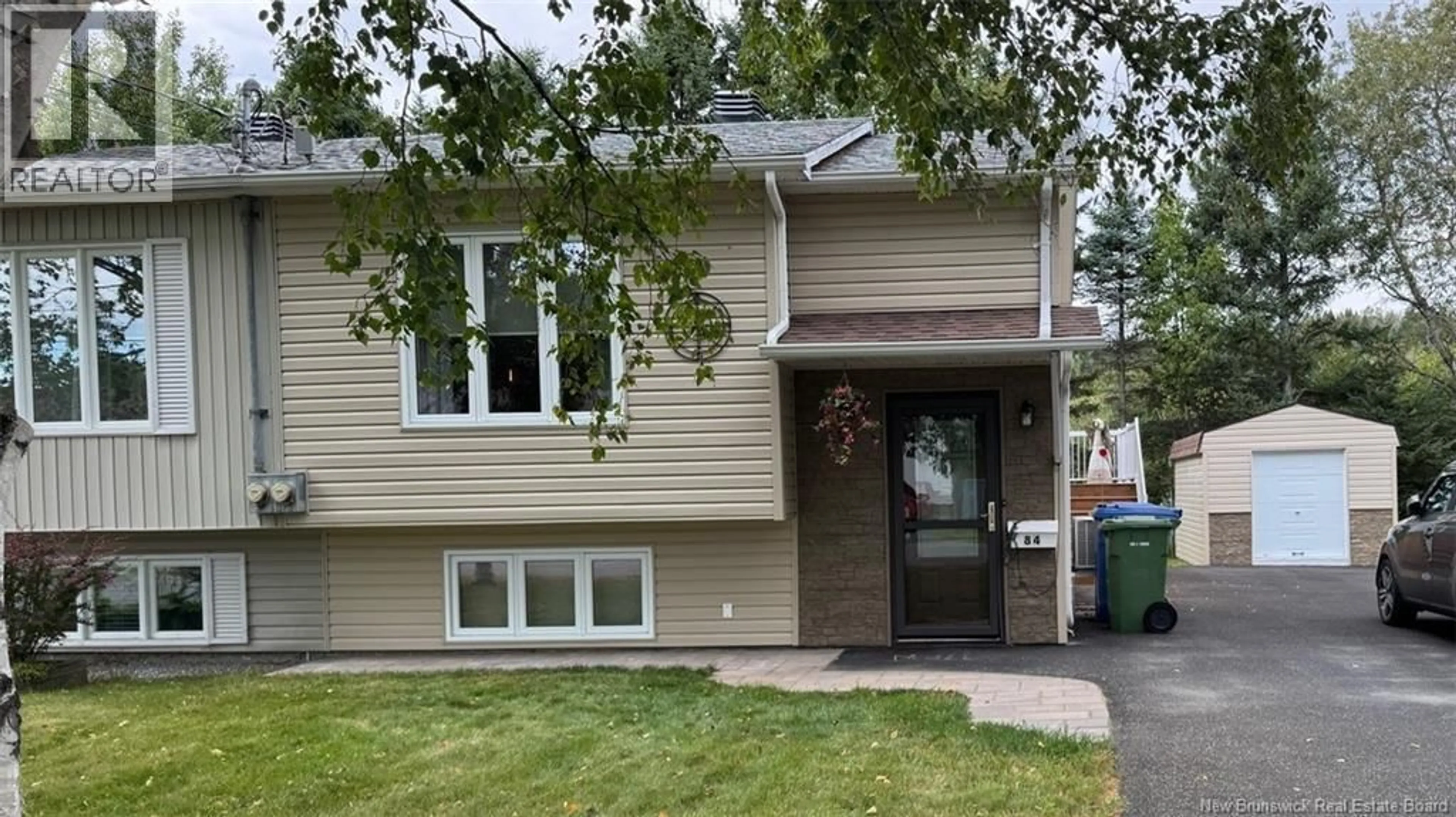 Home with vinyl exterior material, street for 84 BELISLE AVENUE, Edmundston New Brunswick E3V3W7