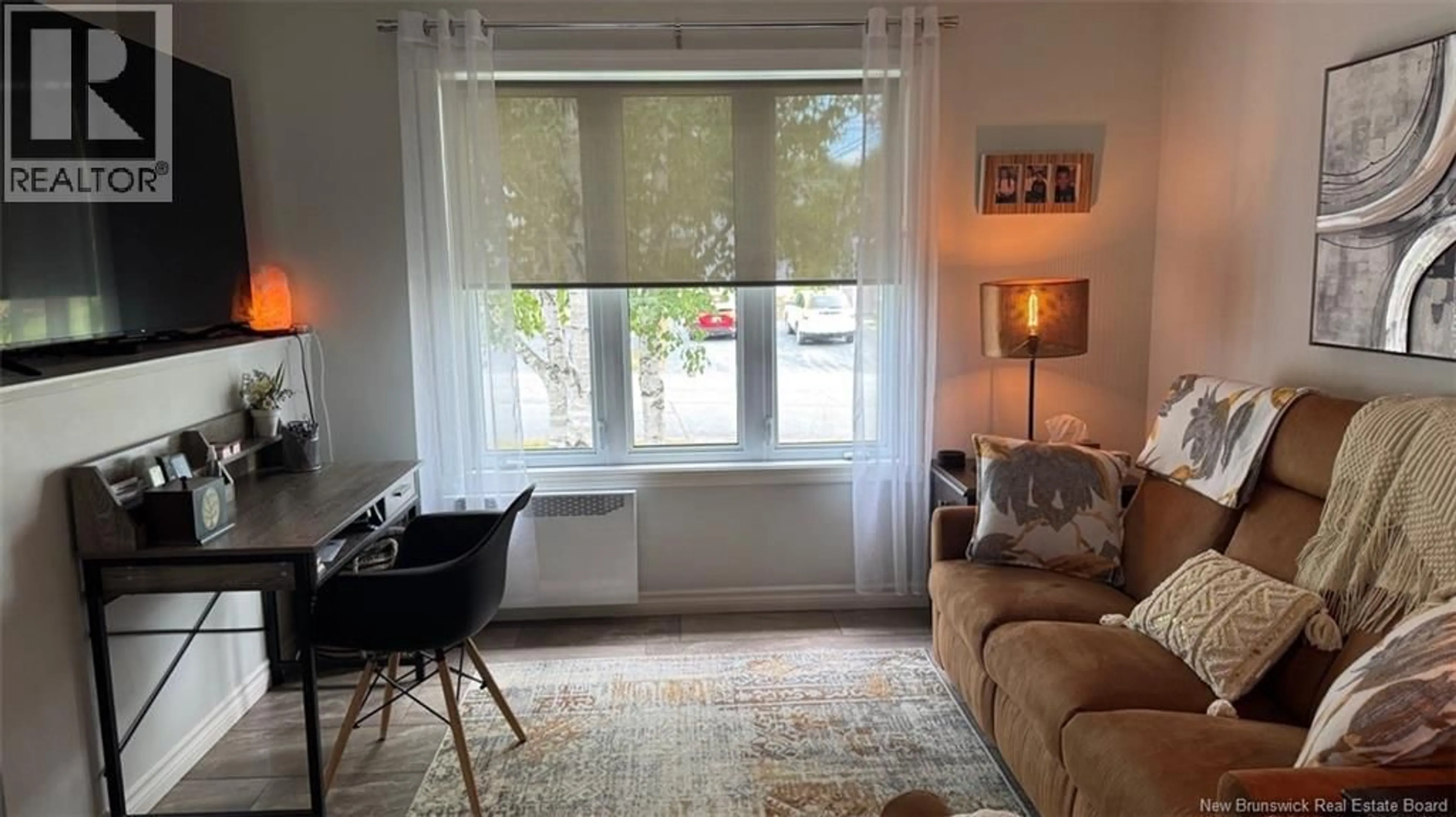 Living room with furniture, unknown for 84 BELISLE AVENUE, Edmundston New Brunswick E3V3W7